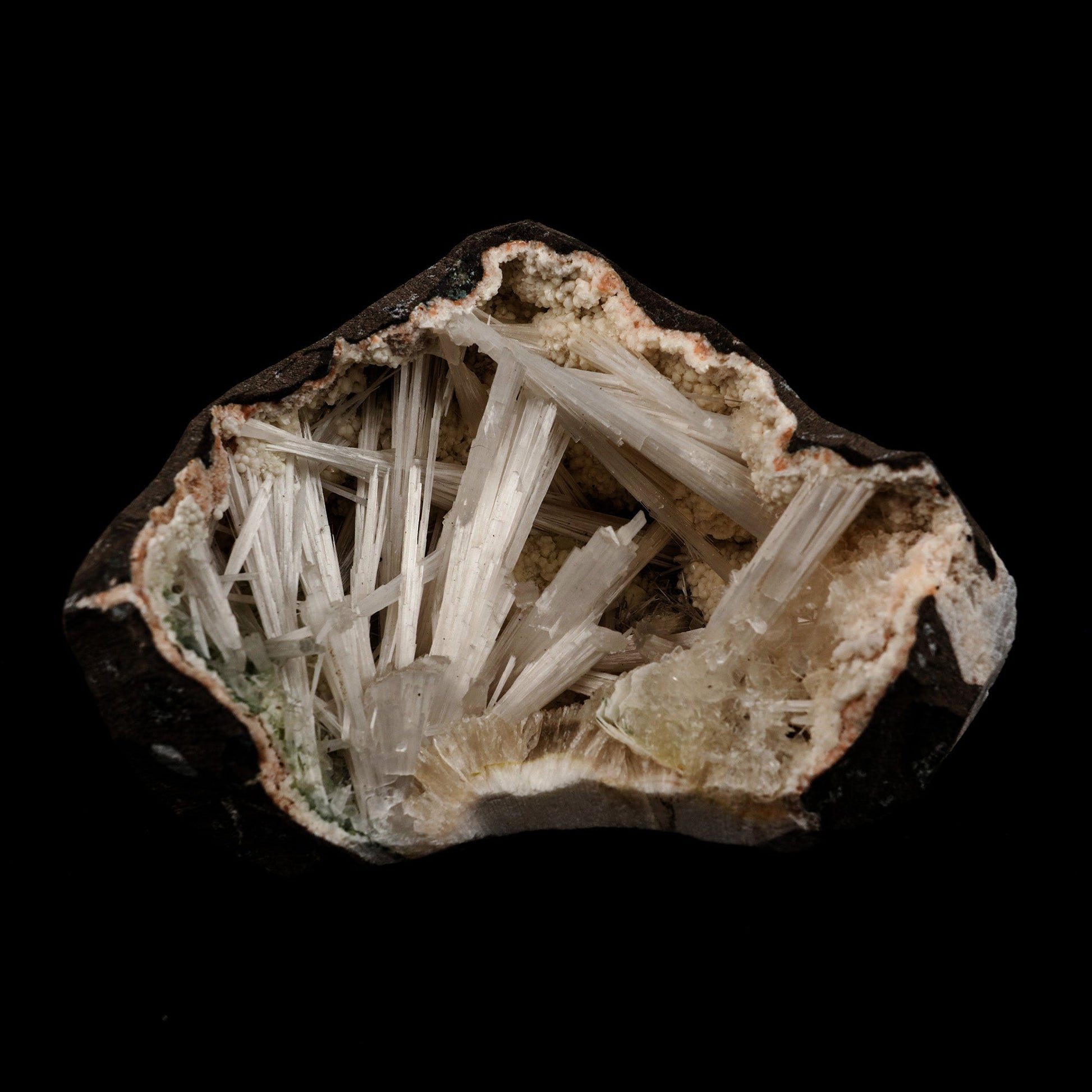 Scolecite Intergrown Sprays Inside Heulandite Geode Natural Mineral Sp…  https://www.superbminerals.us/products/scolecite-intergrown-sprays-inside-heulandite-geode-natural-mineral-specimen-b-5140  Features: Crystals of milky white scolecite grown on matrix of reddish heulandite inside a geode. Unwanted rock by the side of the specimen is cut using saw. Primary Mineral(s): Scolecite Secondary Mineral(s): N/AMatrix: Heulandite 4 Inch x 3 InchWeight : 462 GmsLocality: Aurangabad, Maharashtra, 