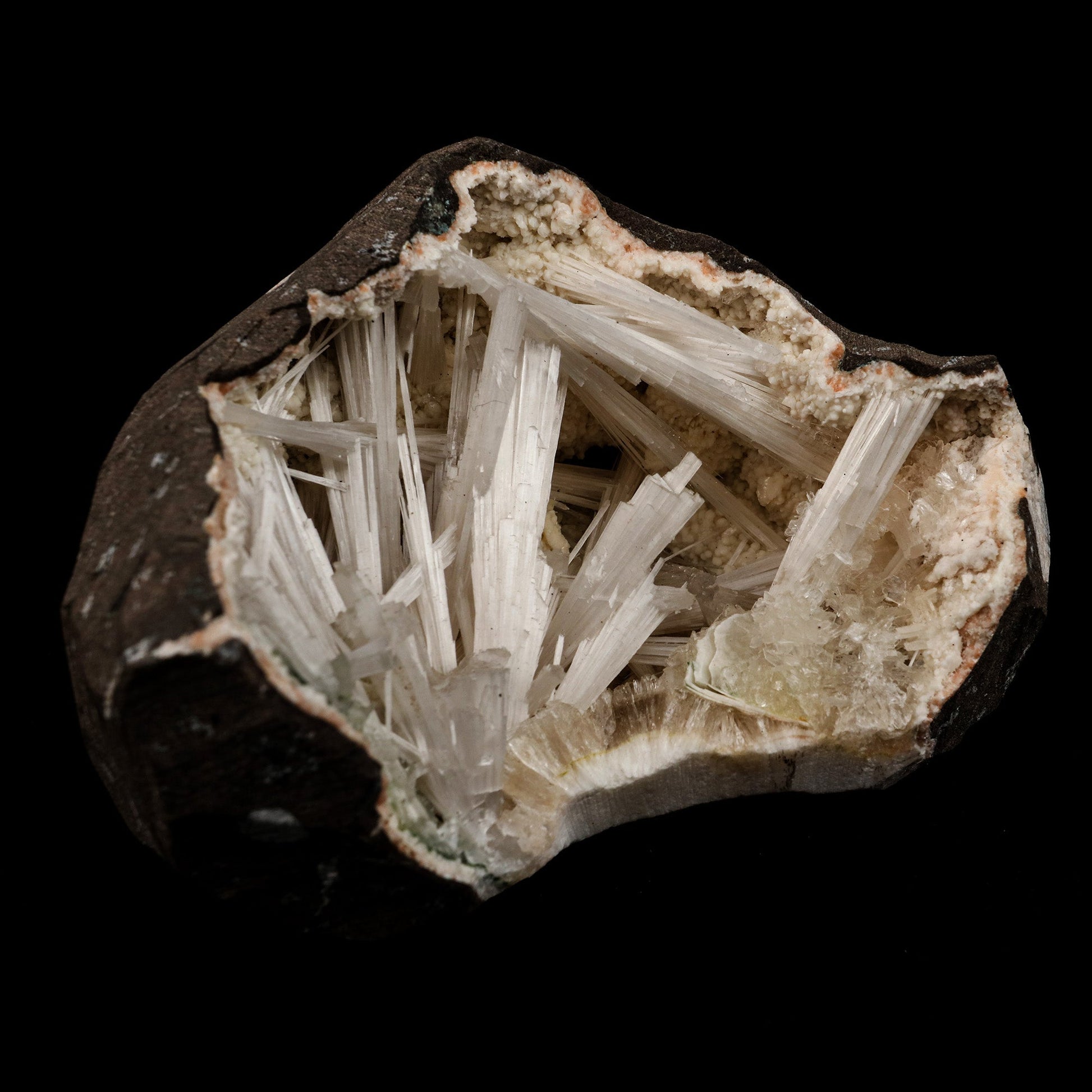 Scolecite Intergrown Sprays Inside Heulandite Geode Natural Mineral Sp…  https://www.superbminerals.us/products/scolecite-intergrown-sprays-inside-heulandite-geode-natural-mineral-specimen-b-5140  Features: Crystals of milky white scolecite grown on matrix of reddish heulandite inside a geode. Unwanted rock by the side of the specimen is cut using saw. Primary Mineral(s): Scolecite Secondary Mineral(s): N/AMatrix: Heulandite 4 Inch x 3 InchWeight : 462 GmsLocality: Aurangabad, Maharashtra, 