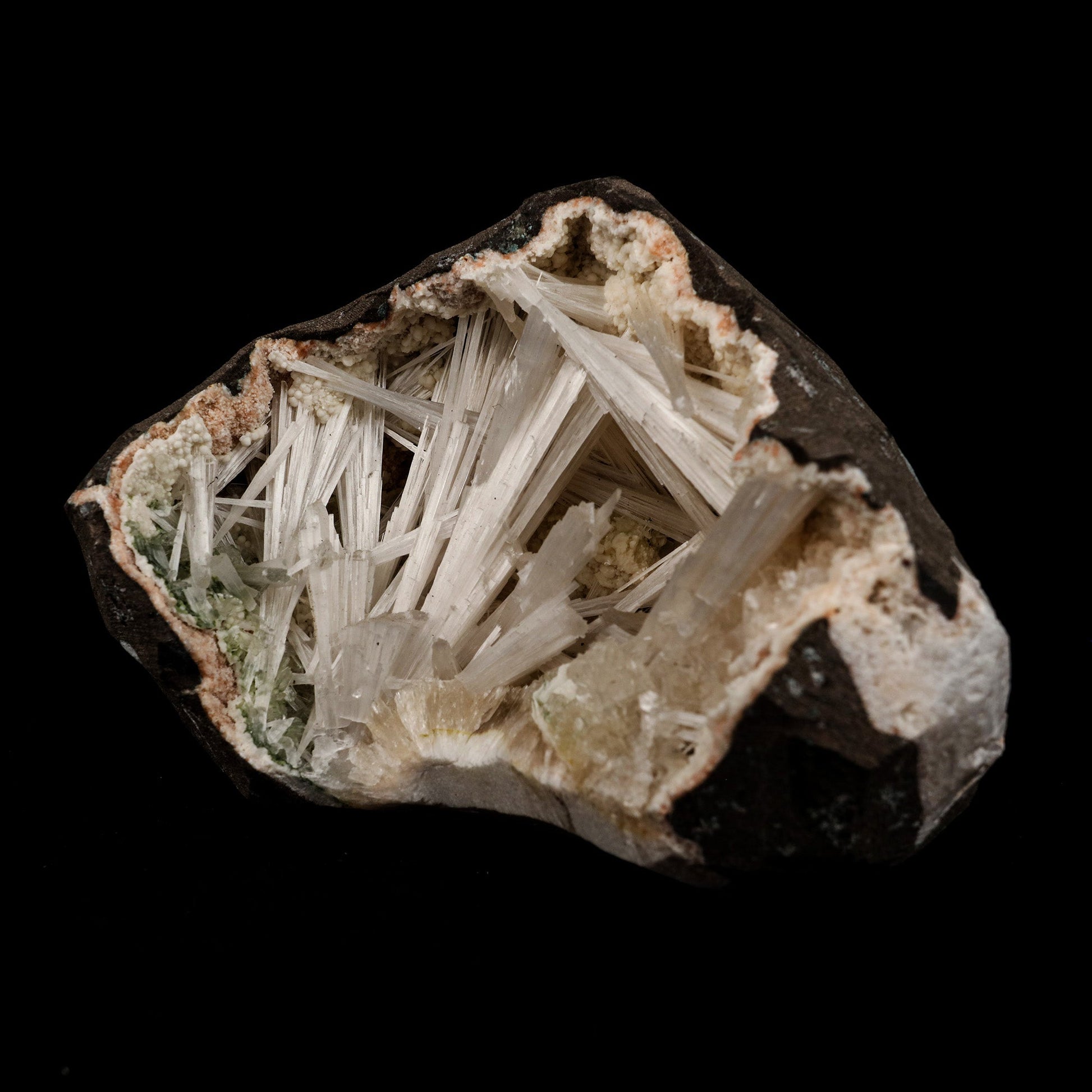 Scolecite Intergrown Sprays Inside Heulandite Geode Natural Mineral Sp…  https://www.superbminerals.us/products/scolecite-intergrown-sprays-inside-heulandite-geode-natural-mineral-specimen-b-5140  Features: Crystals of milky white scolecite grown on matrix of reddish heulandite inside a geode. Unwanted rock by the side of the specimen is cut using saw. Primary Mineral(s): Scolecite Secondary Mineral(s): N/AMatrix: Heulandite 4 Inch x 3 InchWeight : 462 GmsLocality: Aurangabad, Maharashtra, 