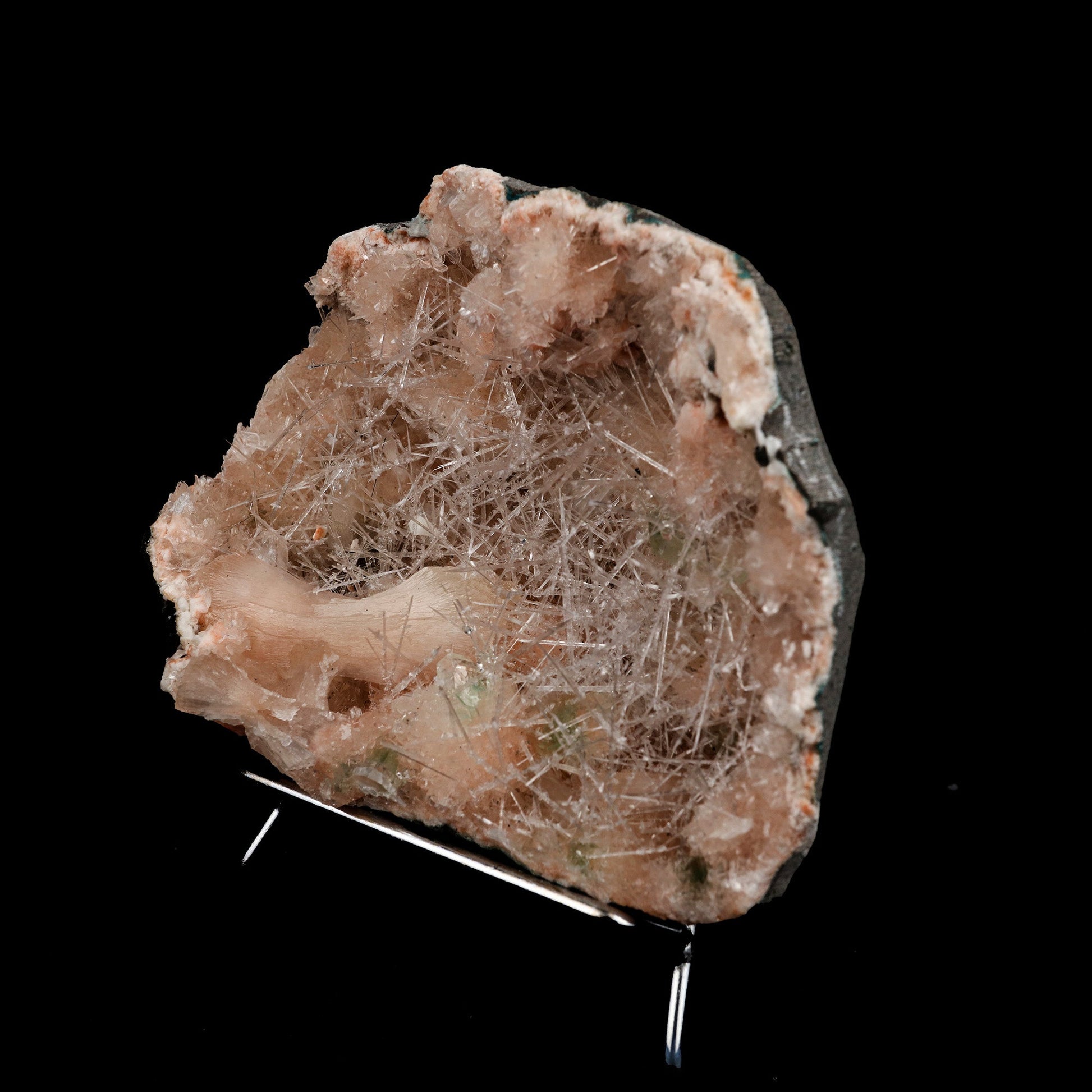 Scolecite Mesh Formation On Stilbite, Heulandite Natural Mineral Speci…  https://www.superbminerals.us/products/scolecite-mesh-formation-on-stilbite-heulandite-natural-mineral-specimen-b-5258  Features: Scholecite crystals are interspersed throughout a very large Geode which is lined with beige Heulandite crystals. The sprays of Scolecite crystals are glossy, colourless, highly translucent, acicular (needle-like) in shape. 