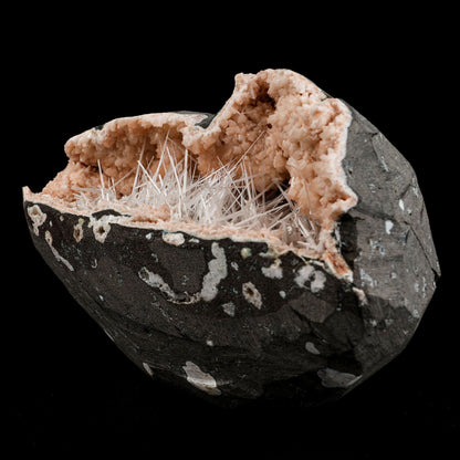 Scolecite Needles Sprays Inside Heulandite Geode Natural Mineral Speci…  https://www.superbminerals.us/products/scolecite-needles-sprays-inside-heulandite-geode-natural-mineral-specimen-b-4960  Features:A striking spray of scolecite blades is aesthetically set on the large matrix on this impressive and sculptural combination from recent finds at Nashik. The glassy, lustrous blades reach about and rest on contrasting pearlescent pretty orange Heulandite geode, accessory and contrast.