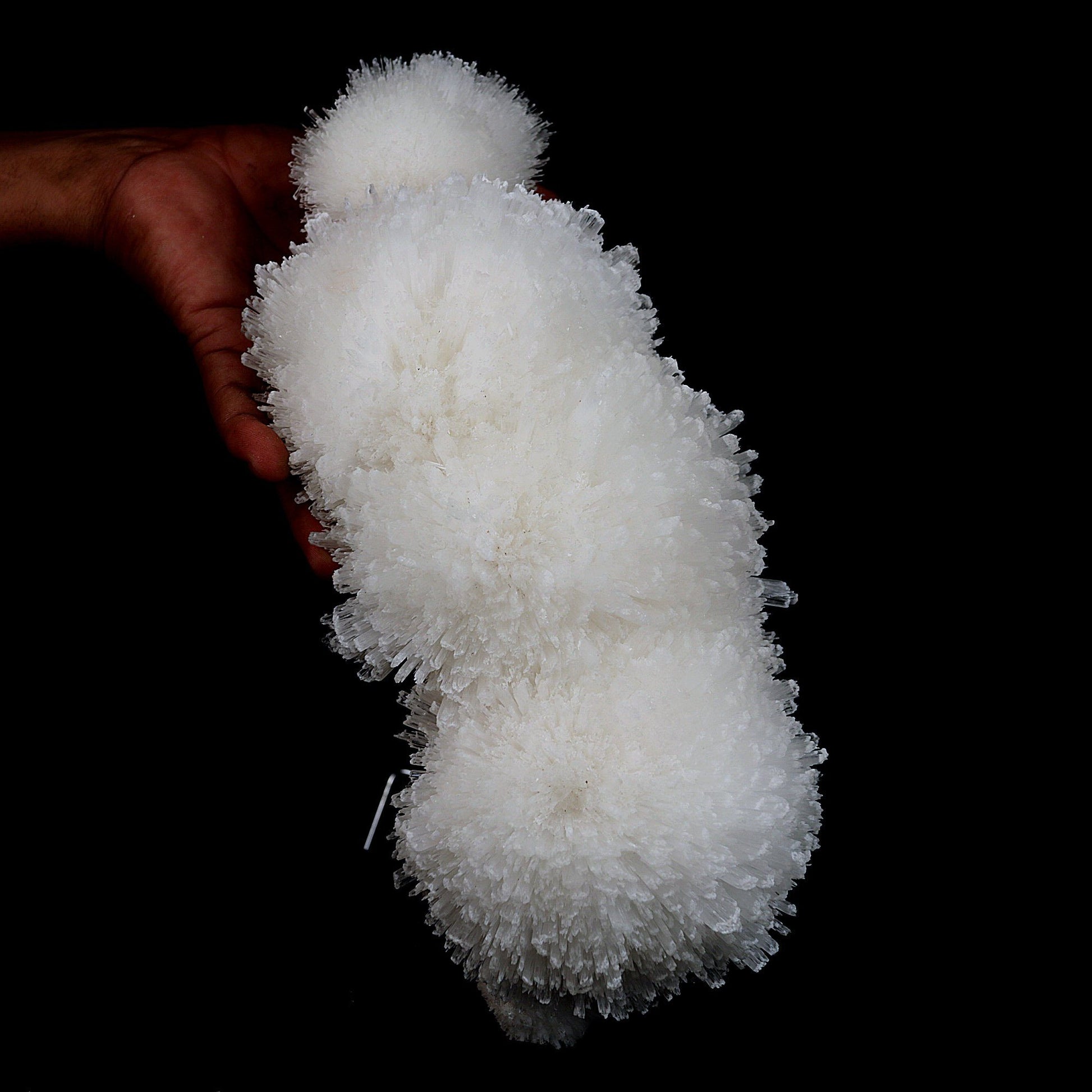 Scolecite Sphere on Matrix Natural Mineral Specimen # B 4763  https://www.superbminerals.us/products/scolecite-sphere-on-matrix-natural-mineral-specimen-b-4763  Features: This is a very rare and sculptural "starburst" of scolecite lathes from recent Pune discoveries that are thick, terminated, glassy, clear to translucent. By the time the blades reach the center of the piece, they have become quite compact. Colorless apophyllite crystals, strewn around like confetti,