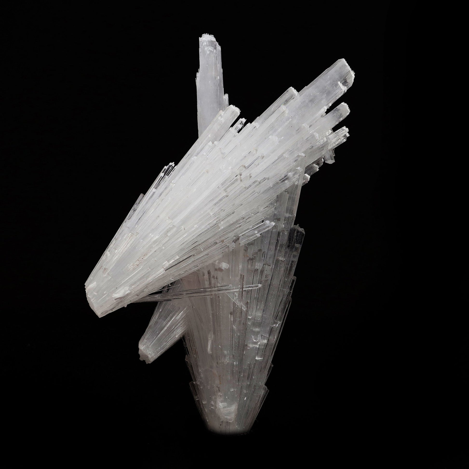 Scolecite Spray Cross Formation Natural Mineral Specimen # B 5202  https://www.superbminerals.us/products/scolecite-spray-cross-formation-natural-mineral-specimen-b-5202  Features: Scolecite forms in clusters of sharp, prismatic, “needle-like” points, which often radiate outward from a source, or, alternatively, criss-cross with each other to form sculptures that are truly a natural art form. Scolecite is mainly found in India, although there are also deposits of white scolecite