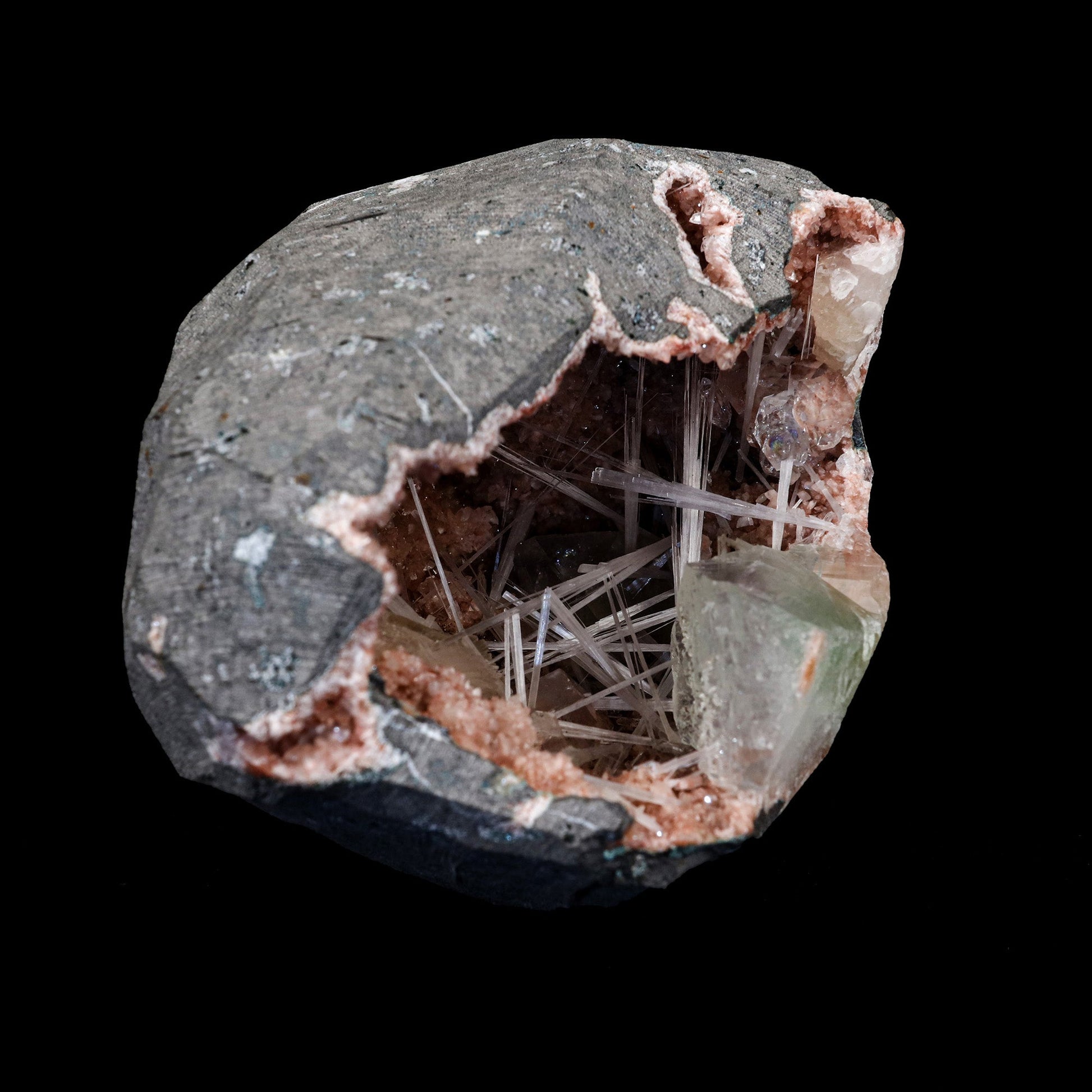 Scolecite Spray with Apophyllite Inside Heulandite Geode Natural Miner…  https://www.superbminerals.us/products/scolecite-spray-with-apophyllite-inside-heulandite-geode-natural-mineral-specimen-b-5280  Features: Transparent green Apophyllite crystals with elongated lustrous transparent colorless Scolecite sprays. The Scolecite crystallized a second generation of smaller Apophyllite crystals. Primary Mineral(s): Scolecite Secondary Mineral(s): ApophylliteMatrix: Heulandite 4 Inch x 3 InchWeight : 629 Gms