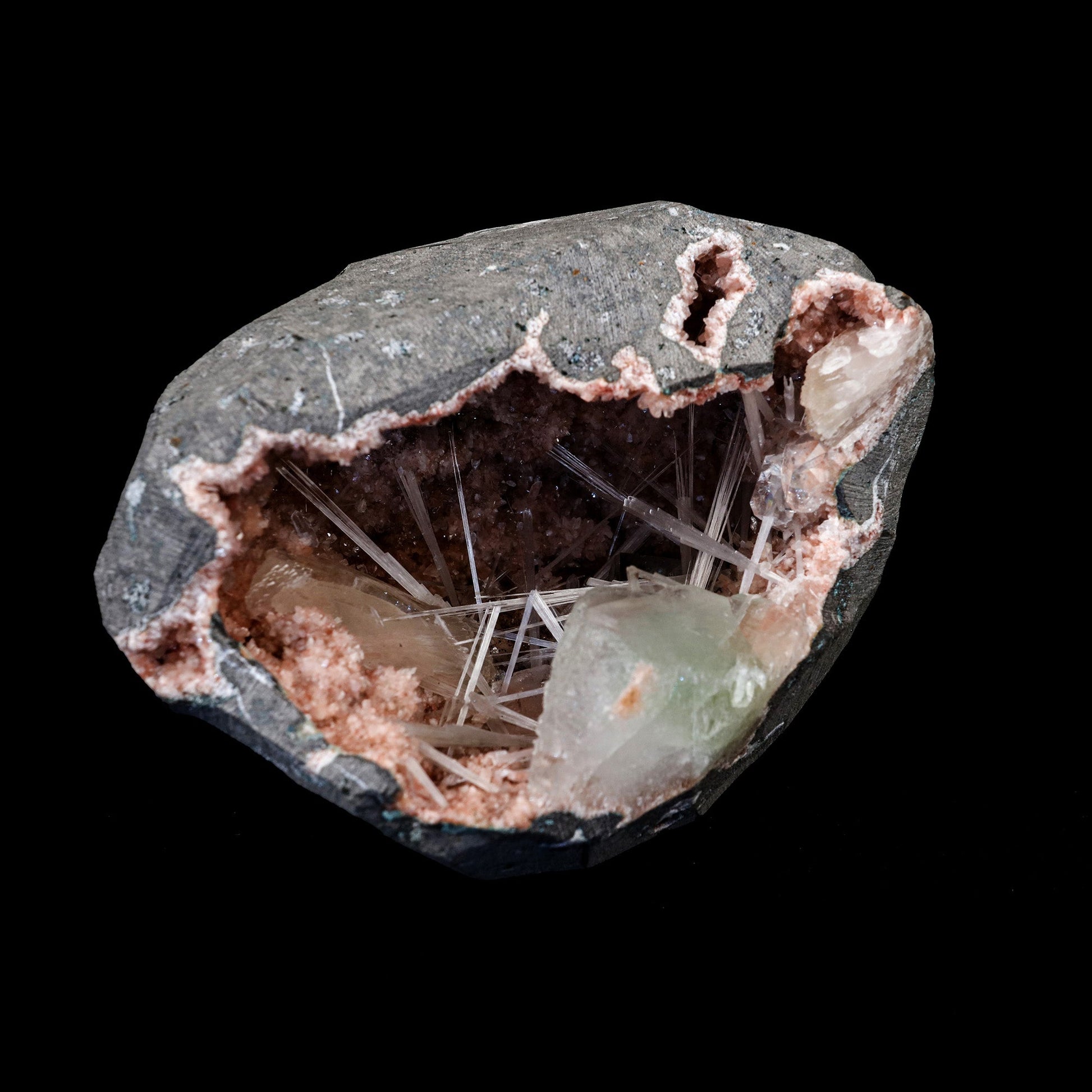 Scolecite Spray with Apophyllite Inside Heulandite Geode Natural Miner…  https://www.superbminerals.us/products/scolecite-spray-with-apophyllite-inside-heulandite-geode-natural-mineral-specimen-b-5280  Features: Transparent green Apophyllite crystals with elongated lustrous transparent colorless Scolecite sprays. The Scolecite crystallized a second generation of smaller Apophyllite crystals. Primary Mineral(s): Scolecite Secondary Mineral(s): ApophylliteMatrix: Heulandite 4 Inch x 3 InchWeight : 629 Gms