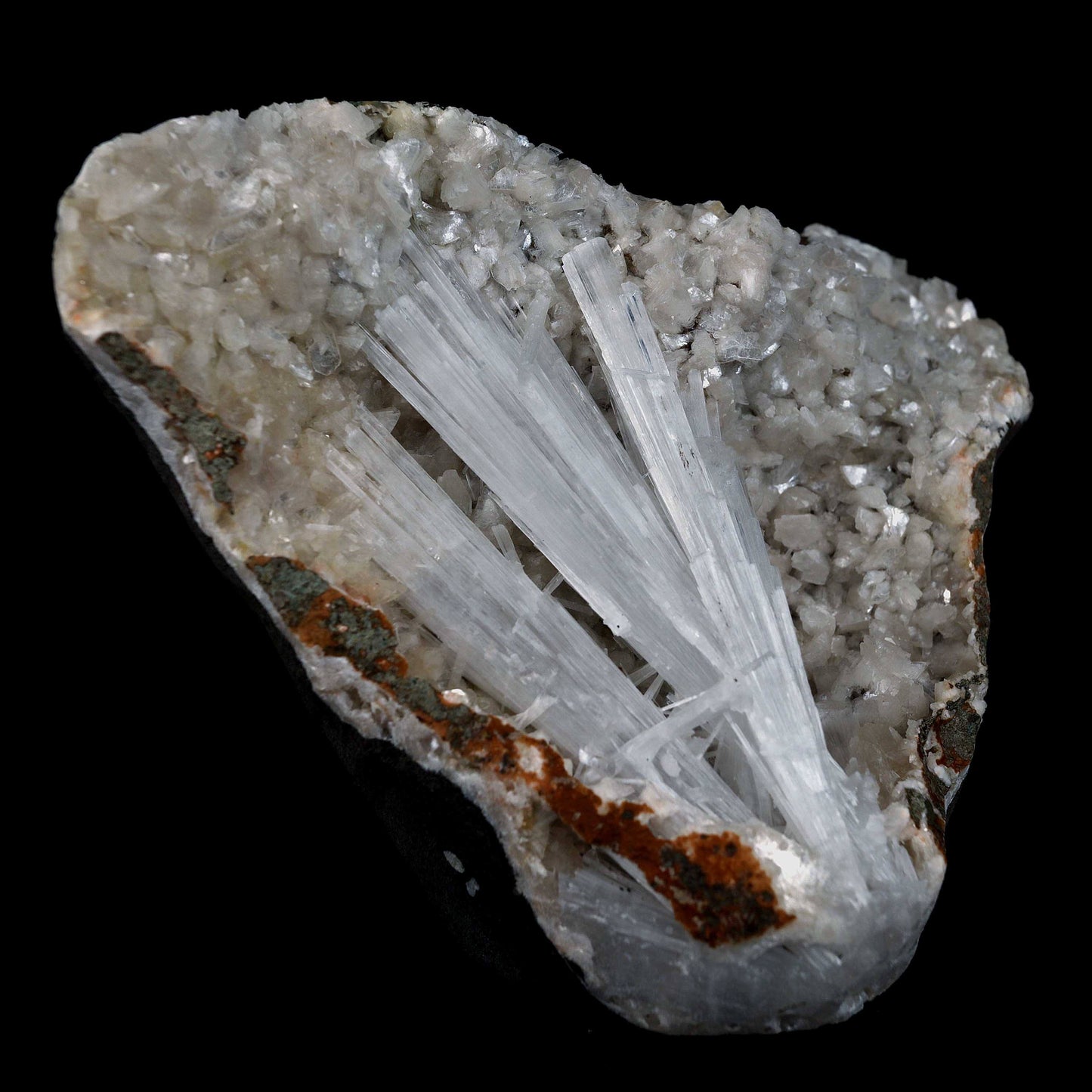 Scolecite Sprays Inside Fan Shape Heulandite Geode Natural Mineral Spe…  https://www.superbminerals.us/products/scolecite-sprays-inside-fan-shape-heulandite-geode-natural-mineral-specimen-b-4651  Features: A beautiful piece with a geode lined with white druzy, glossy Heulandite crystals. The crystals are well defined and have a glossy, almost glassy shine.This item is gleaming. Excellent condition. Primary Mineral(s): Scolecite