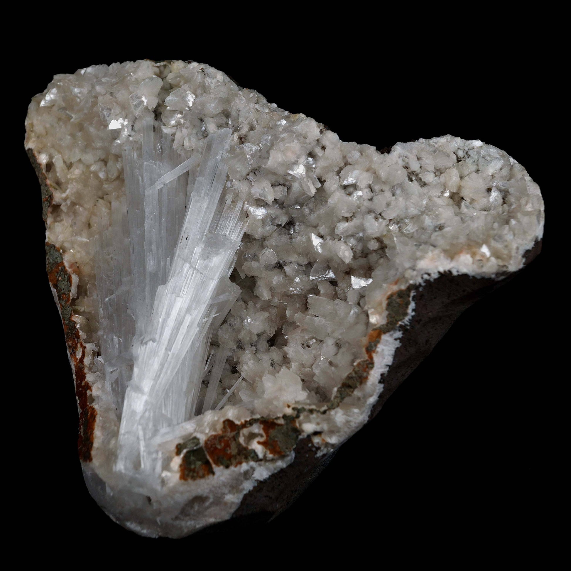 Scolecite Sprays Inside Fan Shape Heulandite Geode Natural Mineral Spe…  https://www.superbminerals.us/products/scolecite-sprays-inside-fan-shape-heulandite-geode-natural-mineral-specimen-b-4651  Features: A beautiful piece with a geode lined with white druzy, glossy Heulandite crystals. The crystals are well defined and have a glossy, almost glassy shine.This item is gleaming. Excellent condition. Primary Mineral(s): Scolecite