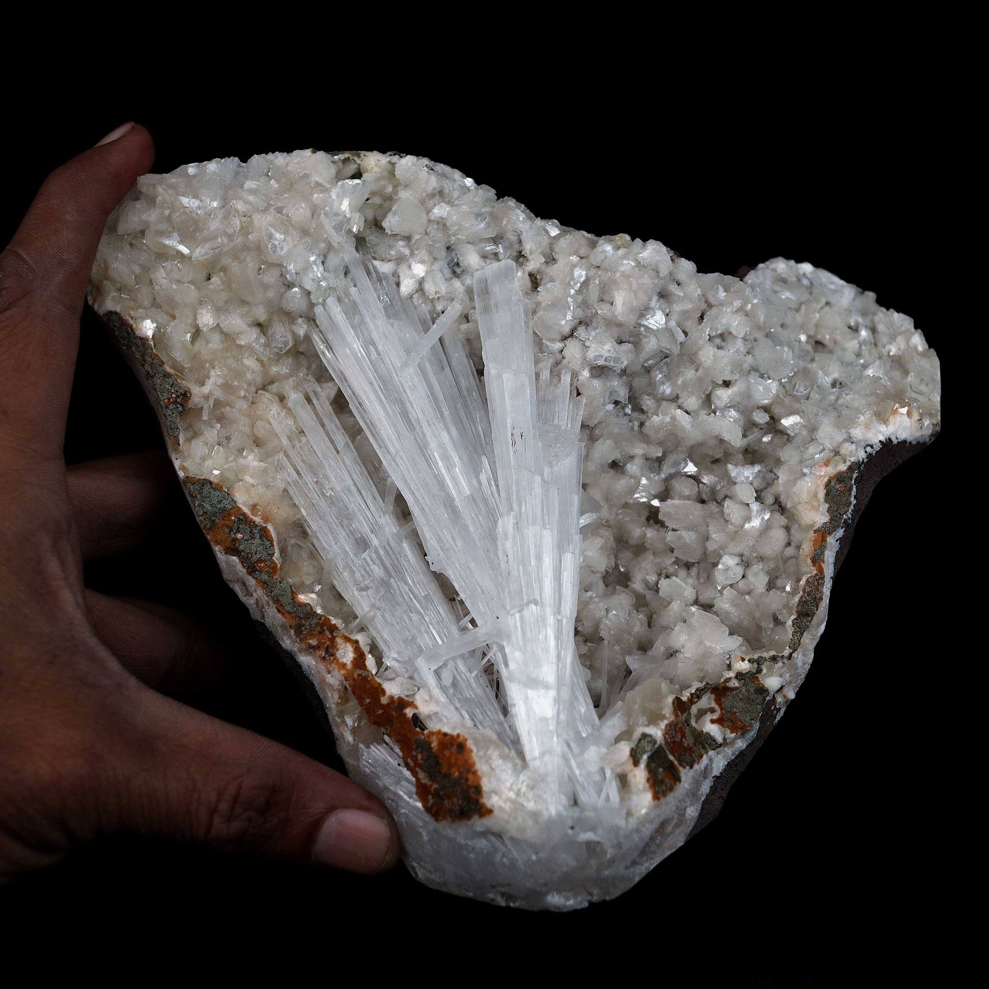 Scolecite Sprays Inside Fan Shape Heulandite Geode Natural Mineral Spe…  https://www.superbminerals.us/products/scolecite-sprays-inside-fan-shape-heulandite-geode-natural-mineral-specimen-b-4651  Features: A beautiful piece with a geode lined with white druzy, glossy Heulandite crystals. The crystals are well defined and have a glossy, almost glassy shine.This item is gleaming. Excellent condition. Primary Mineral(s): Scolecite