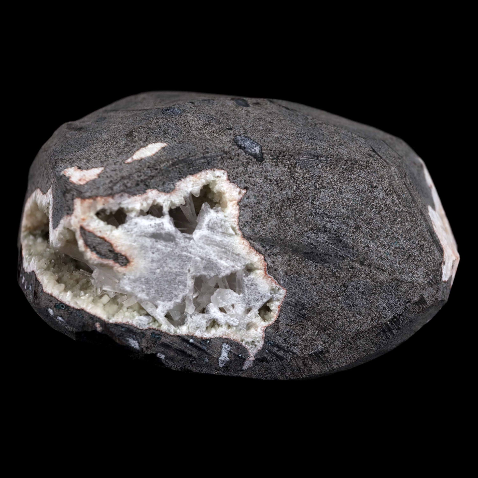 Scolecite Sprays Inside Geode Natural Mineral Specimen # B 4649  https://www.superbminerals.us/products/scolecite-sprays-inside-geode-natural-mineral-specimen-b-4649  Features: A lovely item with a geode lined with beige, glossy Heulandite crystals. The crystals have a pearly, almost glassy sheen and are highly defined.This item is glistening. Very good condition. Primary Mineral(s): ScoleciteSecondary Mineral(s): N/AMatrix: Heulandite12 cm x 6 cm Weight : 910 Gms Locality: Jalgaon