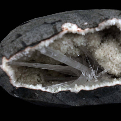 Scolecite Sprays Inside Geode Natural Mineral Specimen # B 4649  https://www.superbminerals.us/products/scolecite-sprays-inside-geode-natural-mineral-specimen-b-4649  Features: A lovely item with a geode lined with beige, glossy Heulandite crystals. The crystals have a pearly, almost glassy sheen and are highly defined.This item is glistening. Very good condition. Primary Mineral(s): ScoleciteSecondary Mineral(s): N/AMatrix: Heulandite12 cm x 6 cm Weight : 910 Gms Locality: Jalgaon