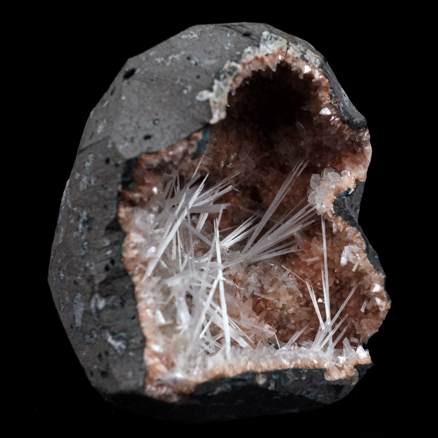 Scolecite Sprays Inside Heulandite Geode Natural Mineral Specimen # B…  https://www.superbminerals.us/products/scolecite-sprays-inside-heulandite-geode-natural-mineral-specimen-b-4908  Features: Scolecite crystals are interspersed throughout a very large Geode that is lined with beige Heulandite crystals. The sprays of Scolecite crystals are glossy, colourless, highly translucent, acicular (needle-like) in shape.The crystal creation is a work of art in and of itself. Primary Mineral(s): Scolecite