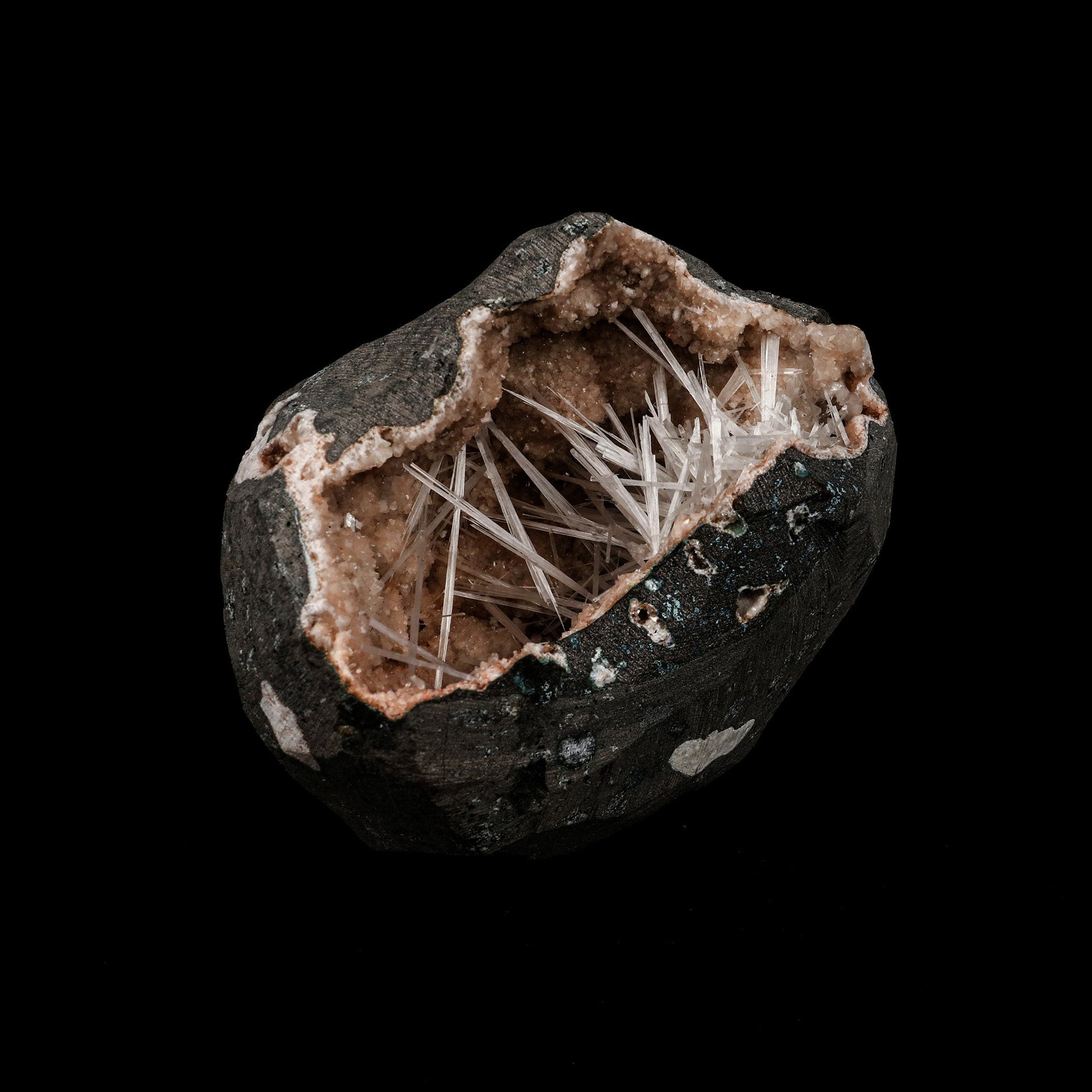 Scolecite Sprays Inside Heulandite Geode Natural Mineral Specimen # B…  https://www.superbminerals.us/products/scolecite-sprays-inside-heulandite-geode-natural-mineral-specimen-b-5264  Features: A geode contains milky white scolecite crystals on reddish heulandite matrix crystals. An unwanted piece of rock is removed by sawing. Primary Mineral(s): Scolecite Secondary Mineral(s): N/AMatrix: Heulandite 4 Inch x 4 InchWeight : 784 GmsLocality: Aurangabad, Maharashtra, India Year of Discovery: 2021