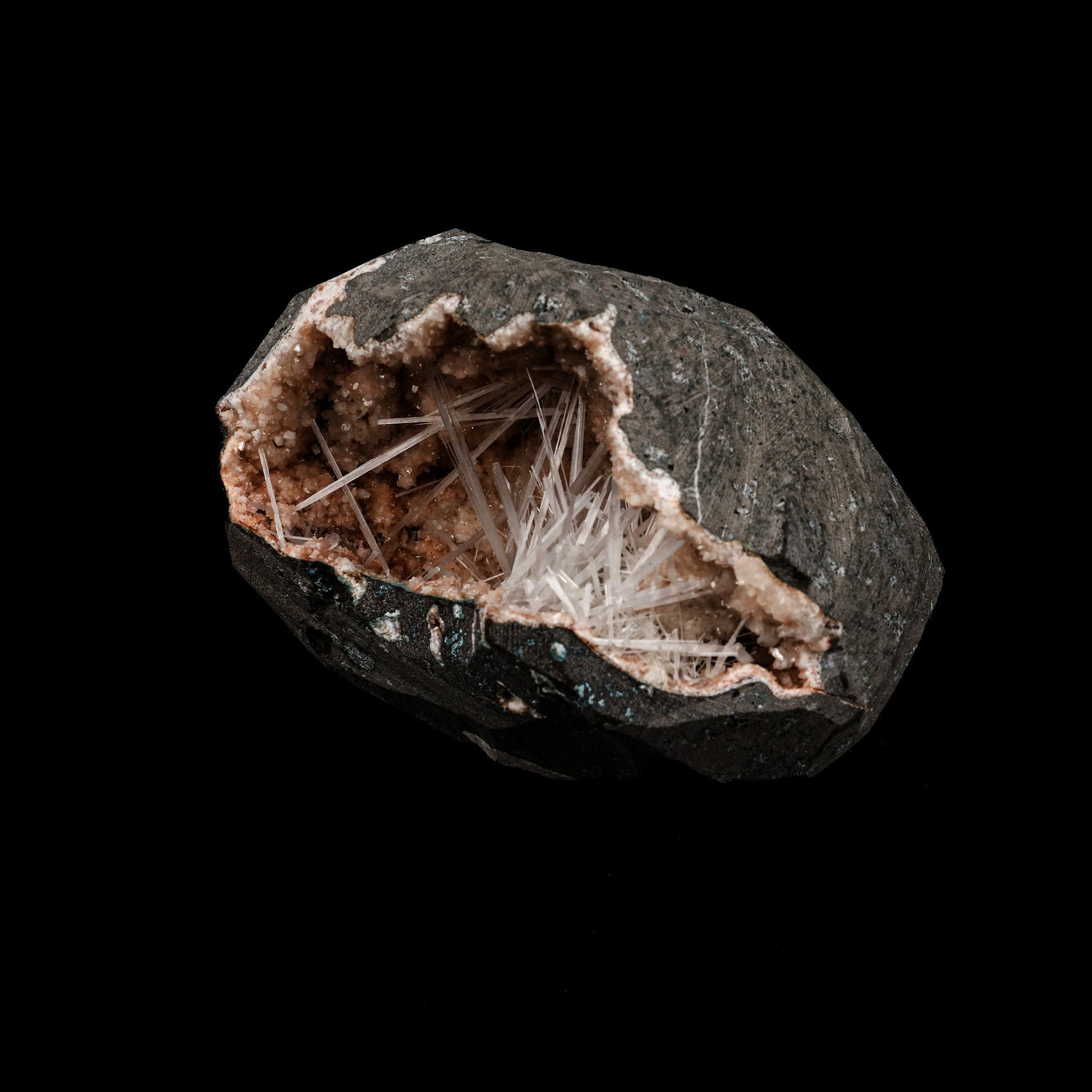 Scolecite Sprays Inside Heulandite Geode Natural Mineral Specimen # B…  https://www.superbminerals.us/products/scolecite-sprays-inside-heulandite-geode-natural-mineral-specimen-b-5264  Features: A geode contains milky white scolecite crystals on reddish heulandite matrix crystals. An unwanted piece of rock is removed by sawing. Primary Mineral(s): Scolecite Secondary Mineral(s): N/AMatrix: Heulandite 4 Inch x 4 InchWeight : 784 GmsLocality: Aurangabad, Maharashtra, India Year of Discovery: 2021