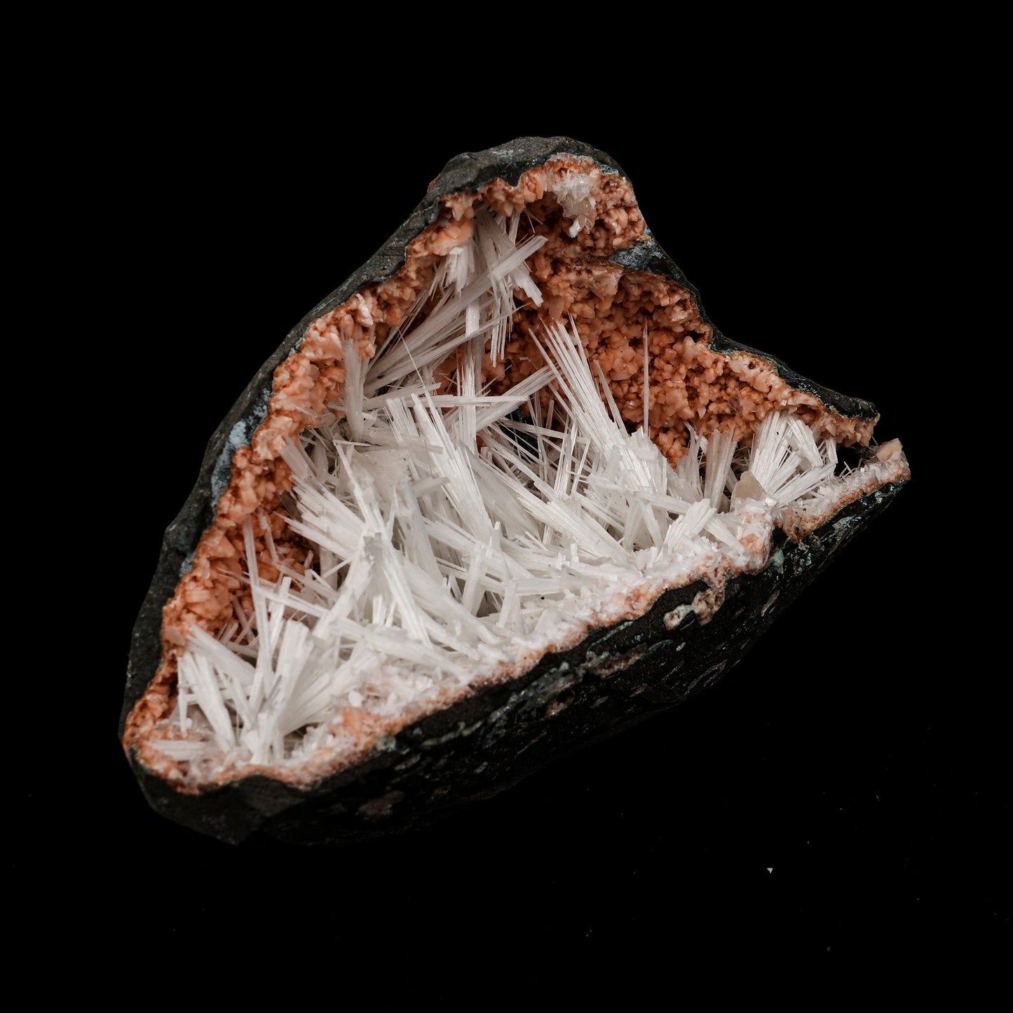 Scolecite Sprays Inside Heulandite Geode Natural Mineral Specimen # B…  https://www.superbminerals.us/products/scolecite-sprays-inside-heulandite-geode-natural-mineral-specimen-b-5286  Features: A huge Geode with beige Heulandite crystals and a conspicuous radial spray of glossy, colourless, extremely transparent, acicular (needle-like) Scolecite crystals throughout, as well as numerous solitary Scolecite crystals. Simply breathtaking - the crystal structure, lustre, contrast, and symmetry are all 