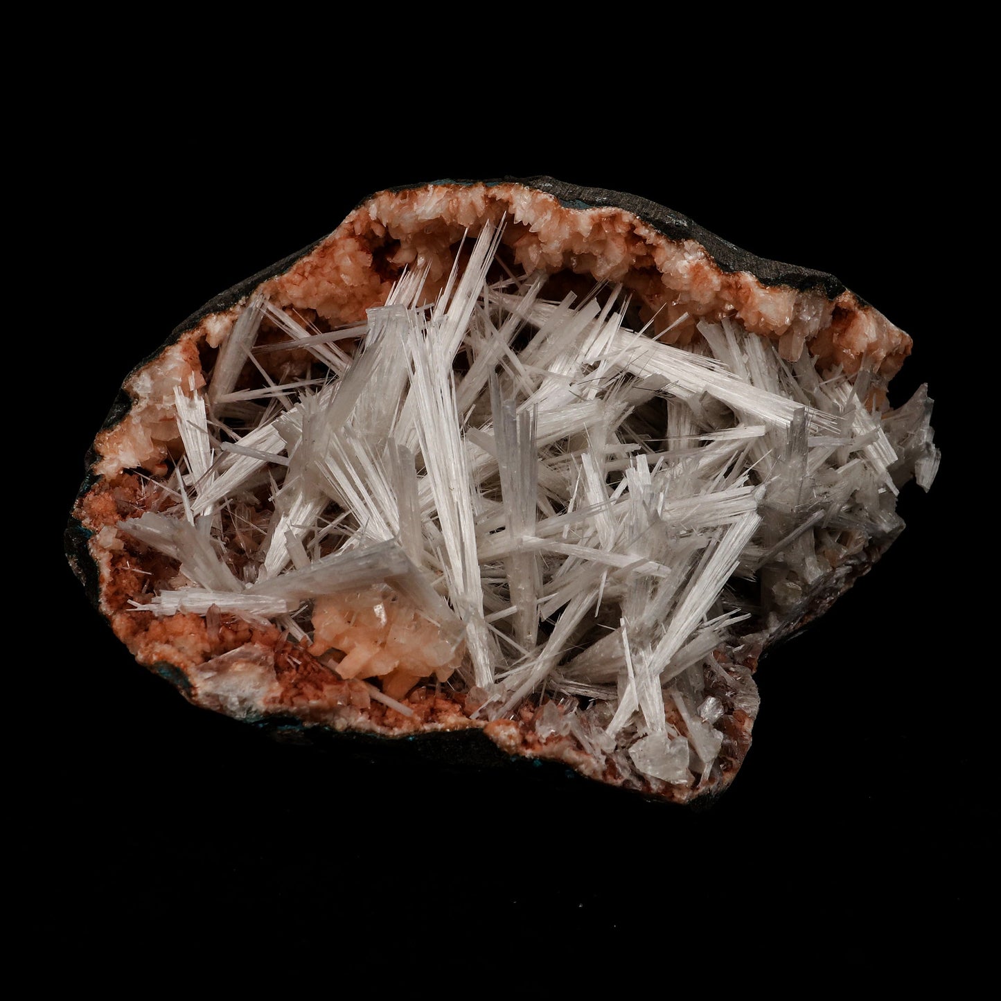 Scolecite Sprays Inside Heulandite Geode Natural Mineral Specimen # B…  https://www.superbminerals.us/products/scolecite-sprays-inside-heulandite-geode-natural-mineral-specimen-b-5304  Features: A geode with beige Heulandite crystals and a radial spray of glossy, colourless, ultra-transparent, needle-like Scolecite crystals, as well as numerous solitary crystals of Scolecite. It is nothing short of breathtaking - the crystal structure, luster, contrast, and symmetry are all perfect.