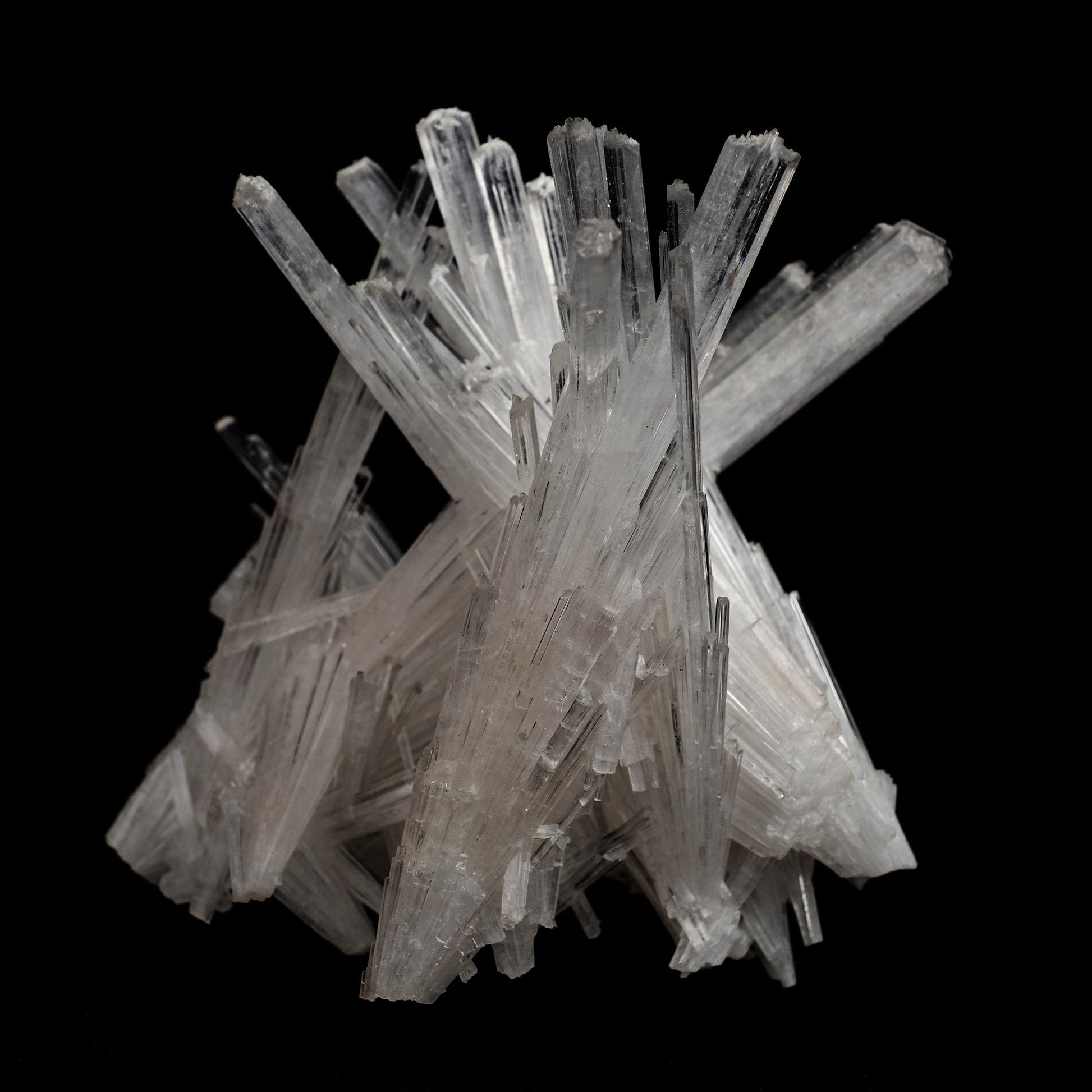 Scolecite Sprays Intergrown Natural Mineral Specimen # B 5104  https://www.superbminerals.us/products/scolecite-sprays-intergrown-natural-mineral-specimen-b-5104  Features: Recent discoveries in Nashik have yielded some spectacular intergrown jackstraw sprays of glassy, iridescent, clear to translucent scolecite prism. STUNNING. The stunning crystals extend in every direction. Primary Mineral(s): Scolecite Secondary Mineral(s): N/AMatrix: N/A 4.5 Inch x 4 InchWeight : 319