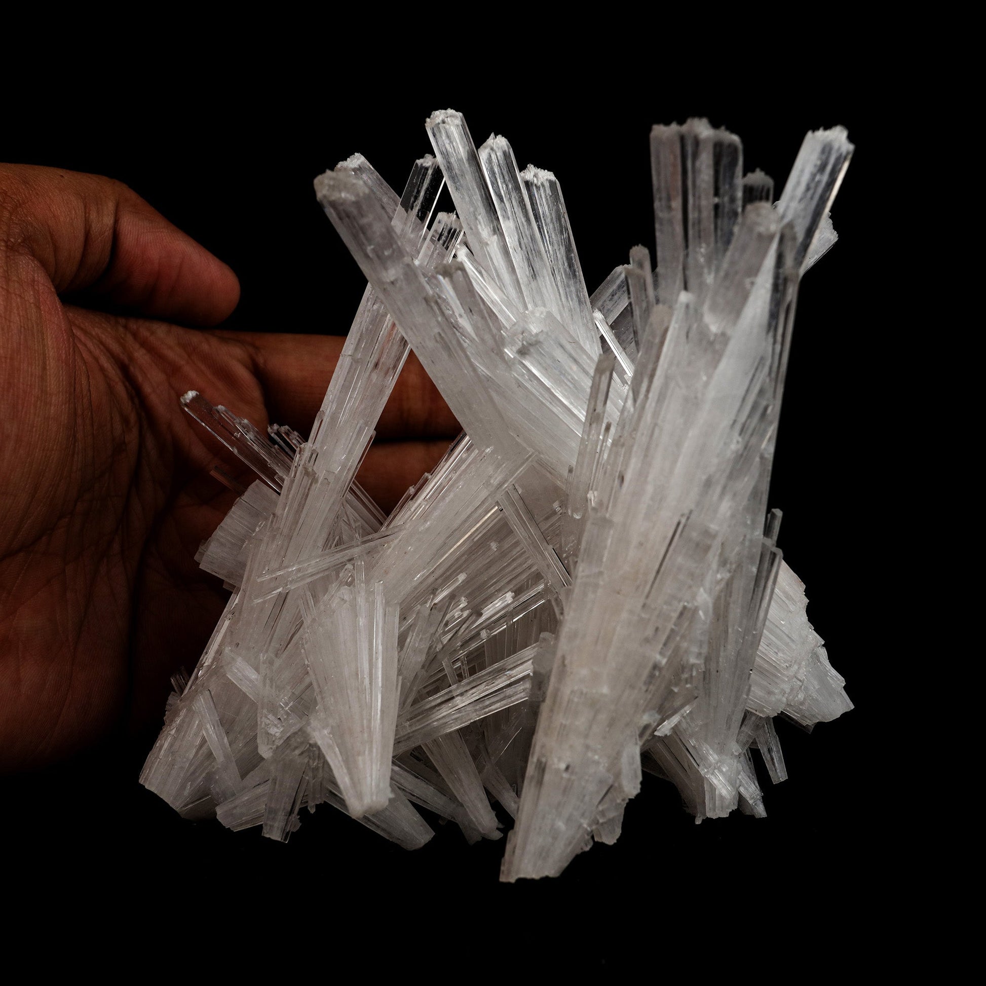 Scolecite Sprays Intergrown Natural Mineral Specimen # B 5104  https://www.superbminerals.us/products/scolecite-sprays-intergrown-natural-mineral-specimen-b-5104  Features: Recent discoveries in Nashik have yielded some spectacular intergrown jackstraw sprays of glassy, iridescent, clear to translucent scolecite prism. STUNNING. The stunning crystals extend in every direction. Primary Mineral(s): Scolecite Secondary Mineral(s): N/AMatrix: N/A 4.5 Inch x 4 InchWeight : 319