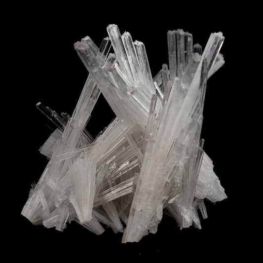 Scolecite Sprays Intergrown Natural Mineral Specimen # B 5104  https://www.superbminerals.us/products/scolecite-sprays-intergrown-natural-mineral-specimen-b-5104  Features: Recent discoveries in Nashik have yielded some spectacular intergrown jackstraw sprays of glassy, iridescent, clear to translucent scolecite prism. STUNNING. The stunning crystals extend in every direction. Primary Mineral(s): Scolecite Secondary Mineral(s): N/AMatrix: N/A 4.5 Inch x 4 InchWeight : 319