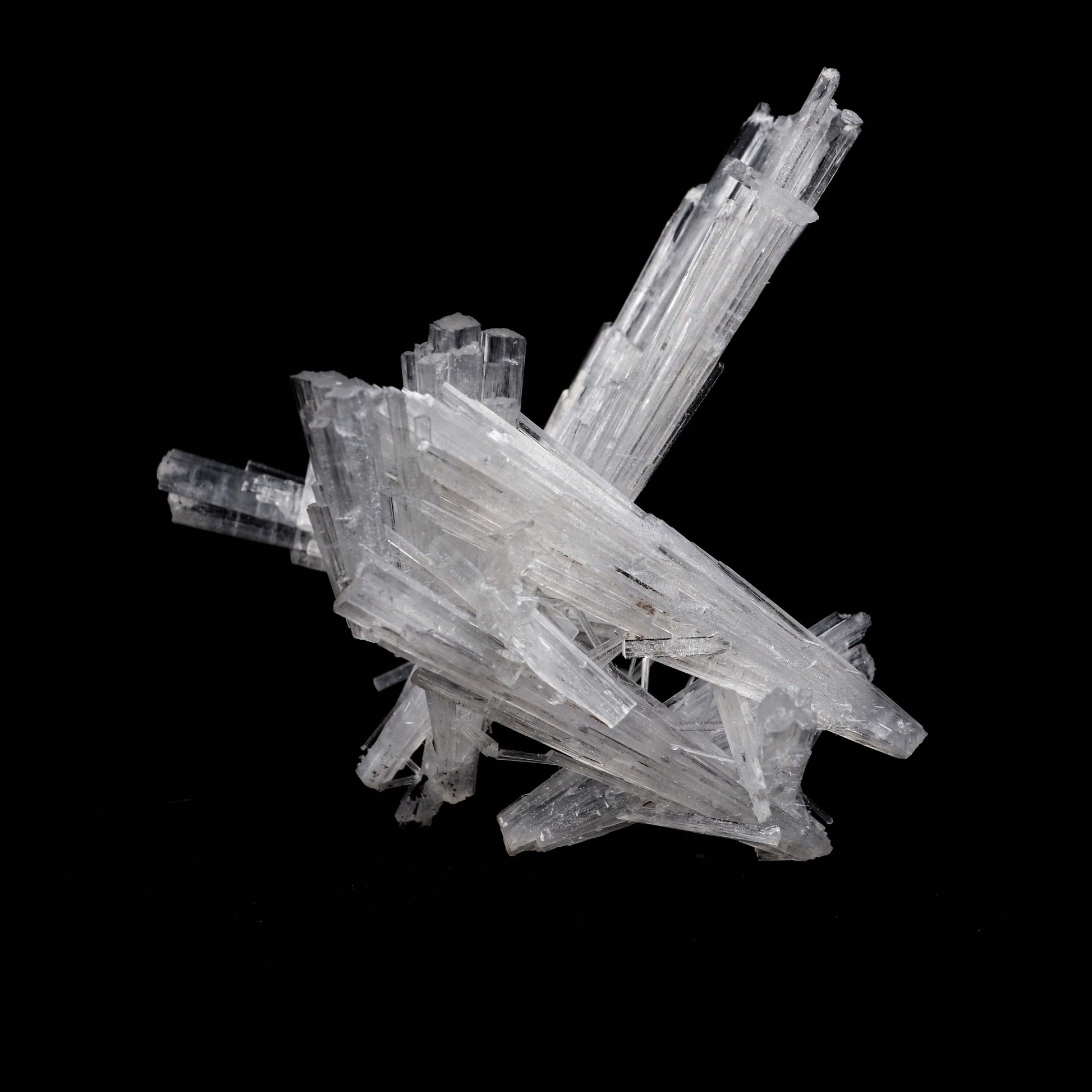 Scolecite Sprays Natural Mineral Specimen # B 5178  https://www.superbminerals.us/products/scolecite-sprays-natural-mineral-specimen-b-5178  Features: Scolecite forms in clusters of sharp, prismatic, “needle-like” points, which often radiate outward from a source, or, alternatively, criss-cross with each other to form sculptures that are truly a natural art form. Scolecite is mainly found in India, although there are also deposits of white scolecite