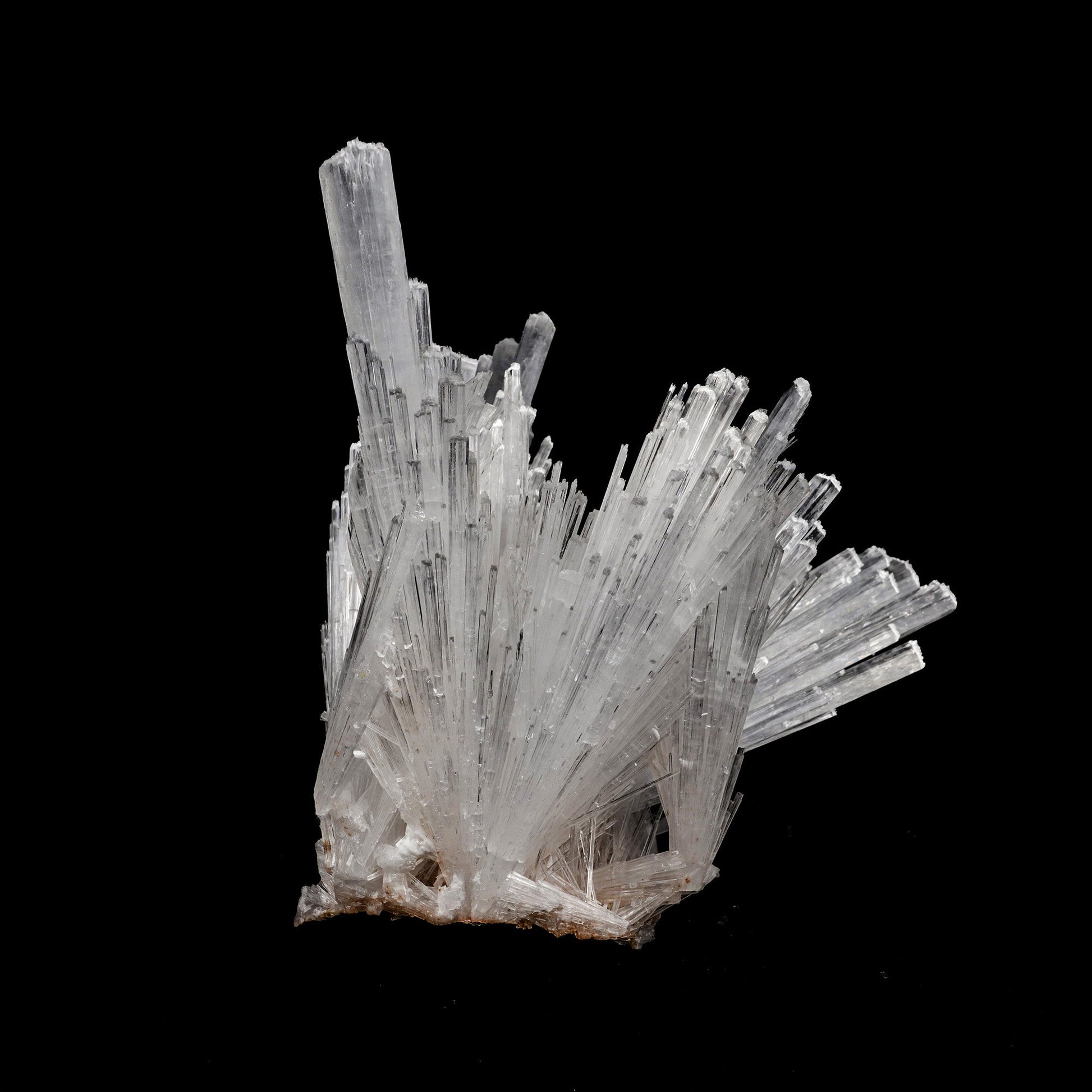 Scolecite Sprays Natural Mineral Specimen # B 5223  https://www.superbminerals.us/products/scolecite-sprays-natural-mineral-specimen-b-5223  Features: A large, tapered spray of elongated colorless Scolecite crystals. There is a small remnant of matrix attached with a small Stilbite crystal. The Scolecite crystals are glassy and highly translucent with transparent terminations. A beautiful specimen in excellent condition. Primary Mineral(s): Scolecite
