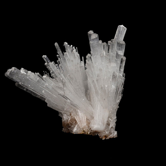 Scolecite Sprays Natural Mineral Specimen # B 5223  https://www.superbminerals.us/products/scolecite-sprays-natural-mineral-specimen-b-5223  Features: A large, tapered spray of elongated colorless Scolecite crystals. There is a small remnant of matrix attached with a small Stilbite crystal. The Scolecite crystals are glassy and highly translucent with transparent terminations. A beautiful specimen in excellent condition. Primary Mineral(s): Scolecite