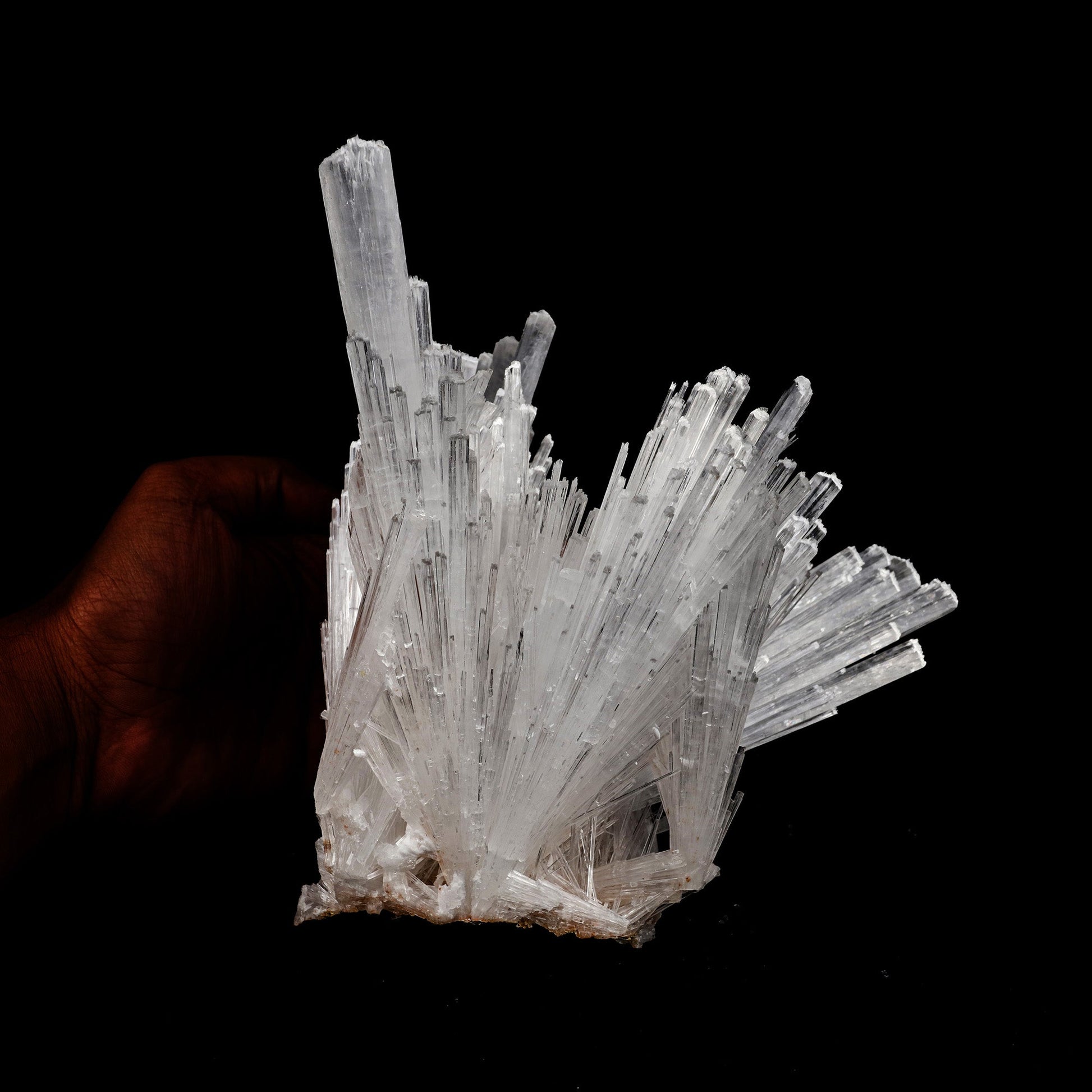 Scolecite Sprays Natural Mineral Specimen # B 5223  https://www.superbminerals.us/products/scolecite-sprays-natural-mineral-specimen-b-5223  Features: A large, tapered spray of elongated colorless Scolecite crystals. There is a small remnant of matrix attached with a small Stilbite crystal. The Scolecite crystals are glassy and highly translucent with transparent terminations. A beautiful specimen in excellent condition. Primary Mineral(s): Scolecite