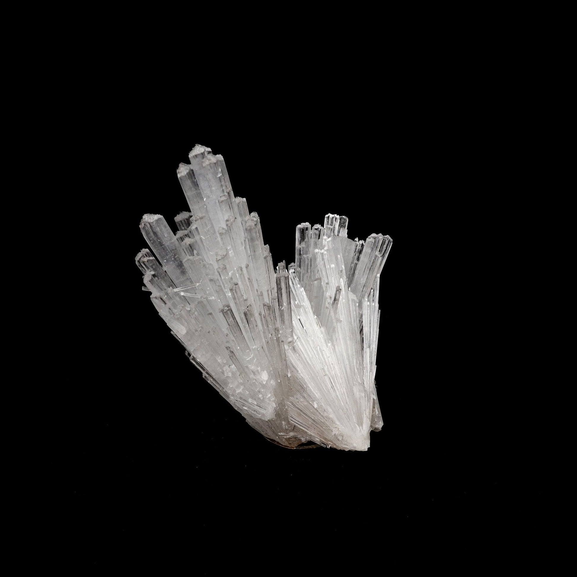 Scolecite Sprays Natural Mineral Specimen # B 5227  https://www.superbminerals.us/products/scolecite-sprays-natural-mineral-specimen-b-5227  Features: A huge, tapering spray of colourless elongated Scolecite crystals. A little fragment of matrix is linked to a small Stilbite crystal. Scolecite crystals have a glassy appearance and are highly translucent, with transparent terminations. A lovely specimen in superb condition. Primary Mineral(s): Scolecite