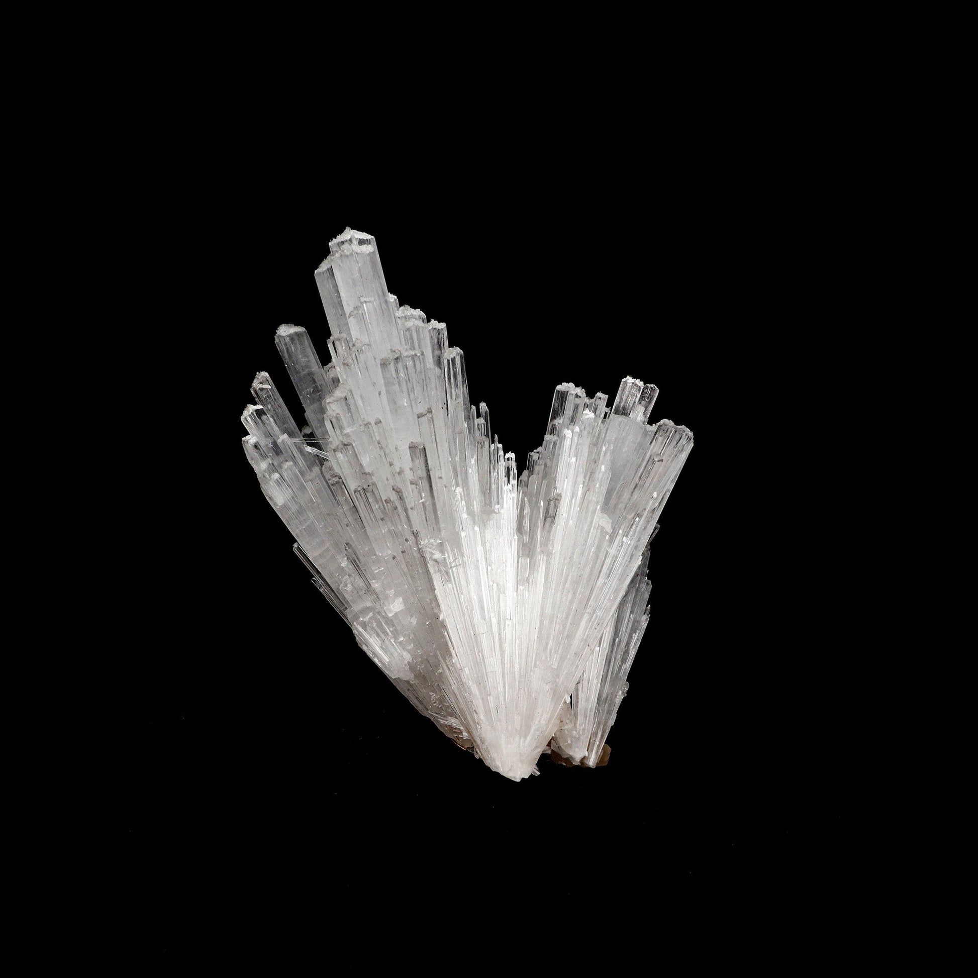 Scolecite Sprays Natural Mineral Specimen # B 5227  https://www.superbminerals.us/products/scolecite-sprays-natural-mineral-specimen-b-5227  Features: A huge, tapering spray of colourless elongated Scolecite crystals. A little fragment of matrix is linked to a small Stilbite crystal. Scolecite crystals have a glassy appearance and are highly translucent, with transparent terminations. A lovely specimen in superb condition. Primary Mineral(s): Scolecite