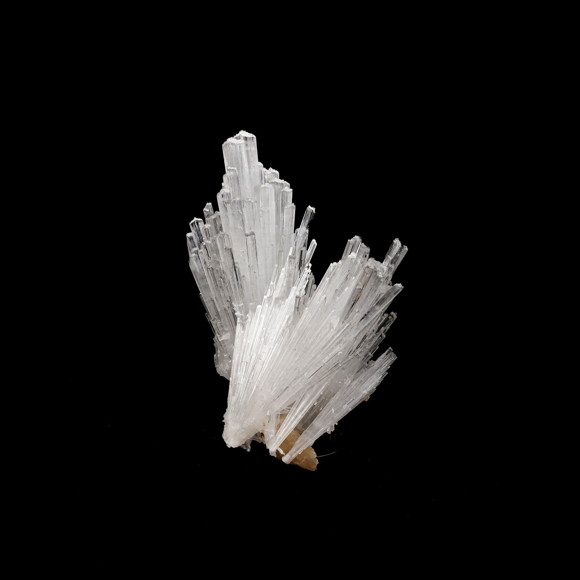 Scolecite Sprays Natural Mineral Specimen # B 5227  https://www.superbminerals.us/products/scolecite-sprays-natural-mineral-specimen-b-5227  Features: A huge, tapering spray of colourless elongated Scolecite crystals. A little fragment of matrix is linked to a small Stilbite crystal. Scolecite crystals have a glassy appearance and are highly translucent, with transparent terminations. A lovely specimen in superb condition. Primary Mineral(s): Scolecite