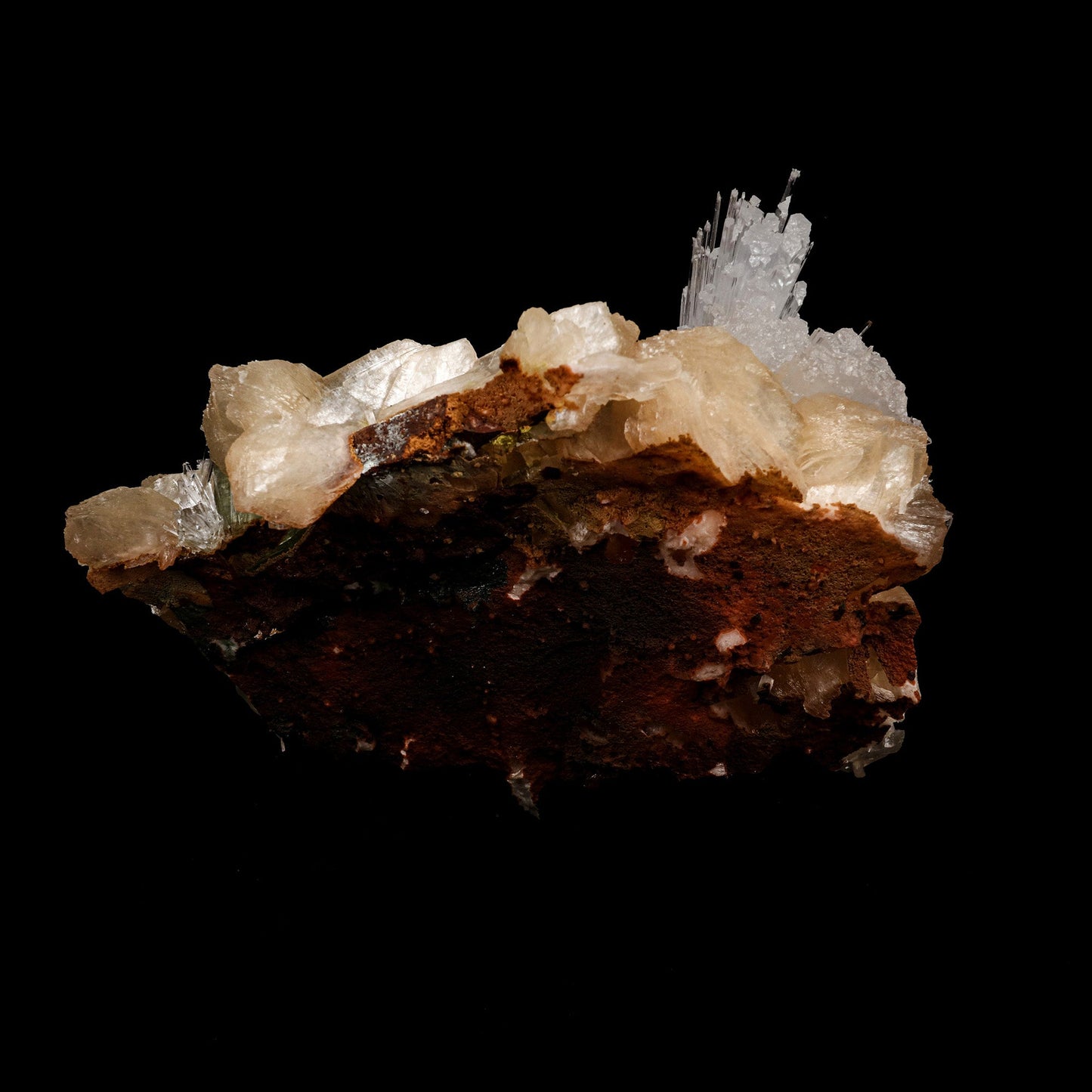 Scolecite Sprays with Green Apophyllite on Stilbite Natural Mineral Sp…  https://www.superbminerals.us/products/scolecite-sprays-with-green-apophyllite-on-stilbite-natural-mineral-specimen-b-5250  Features: A group of thin scolecite crystals with an elongated prism and transparence in the terminal crystal area. They form radial aggregates penetrating apophyllite crystals and disposed randomly. There are tetragonal prisms and a few pyramidal faces on the top and base, along with great luster 