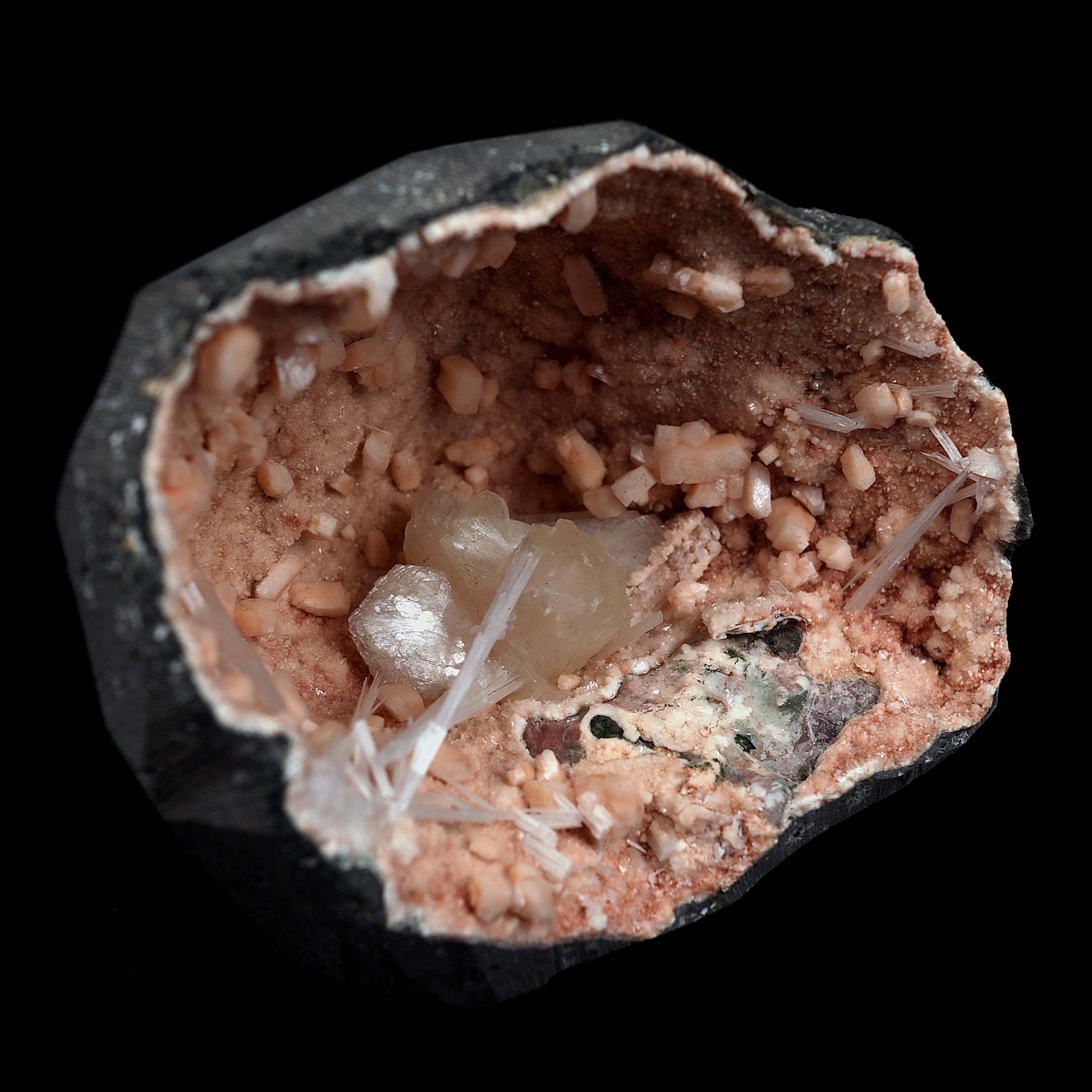 Scolecite Sprays with Inside Heulandite Geode Natural Mineral Specimen…  https://www.superbminerals.us/products/scolecite-sprays-with-inside-heulandite-geode-natural-mineral-specimen-b-4539  Features:Scolecite radial aggregate in a thin crystal-lined vug. The artwork was a bit tough to shoot, but in person, it is much more impressive. They will go down in history as the greatest minerals ever unearthed, because many of them are the FINEST crystallised specimens of their own species anywhere on the globe. 