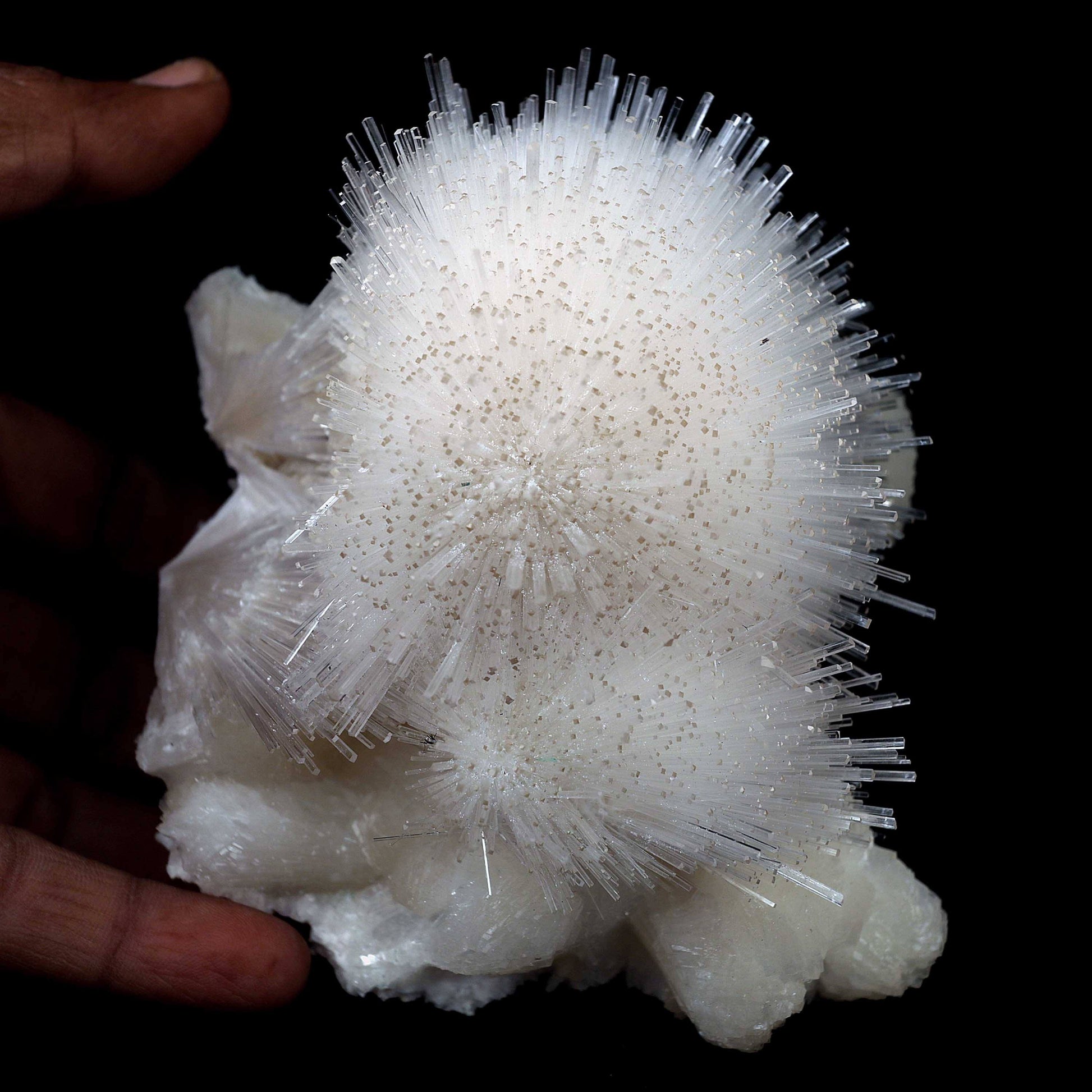 Scoleicte On Stilbite # B 4358  https://www.superbminerals.us/products/scoleicte-on-stilbite-b-4358  Features:A stunning specimen featuring a large, hemispherical formation of colorless, transparent, lustrous acicular Scolecite crystals on peach-colored Stilbite. An amazing piece with superb crystal formation, contrast, luster and contrast. In excellent condition. A great addition to any collection.