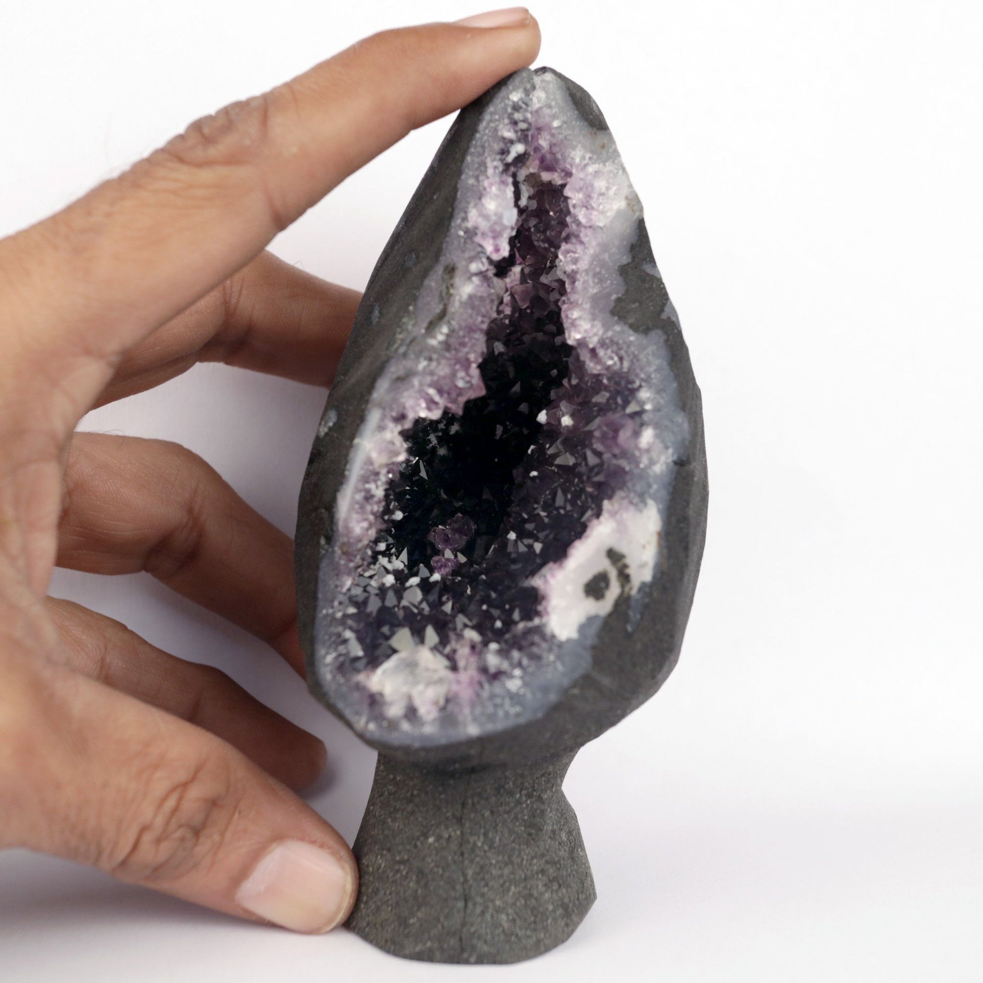 Sparkling Amethyst Geode Natural Mineral Specimen # B 4710  https://www.superbminerals.us/products/sparkling-amethyst-geode-natural-mineral-specimen-b-4710  Features: A very large plate of lustrous, large deep-purple Amethyst crystals with two clusters (one large and one smaller) of highly translucent, colorless, intergrown parallel “nailhead spar” crystals emanating from the center of the plate of Amethyst. It is incredible! Amazing color, luster, symmetry 