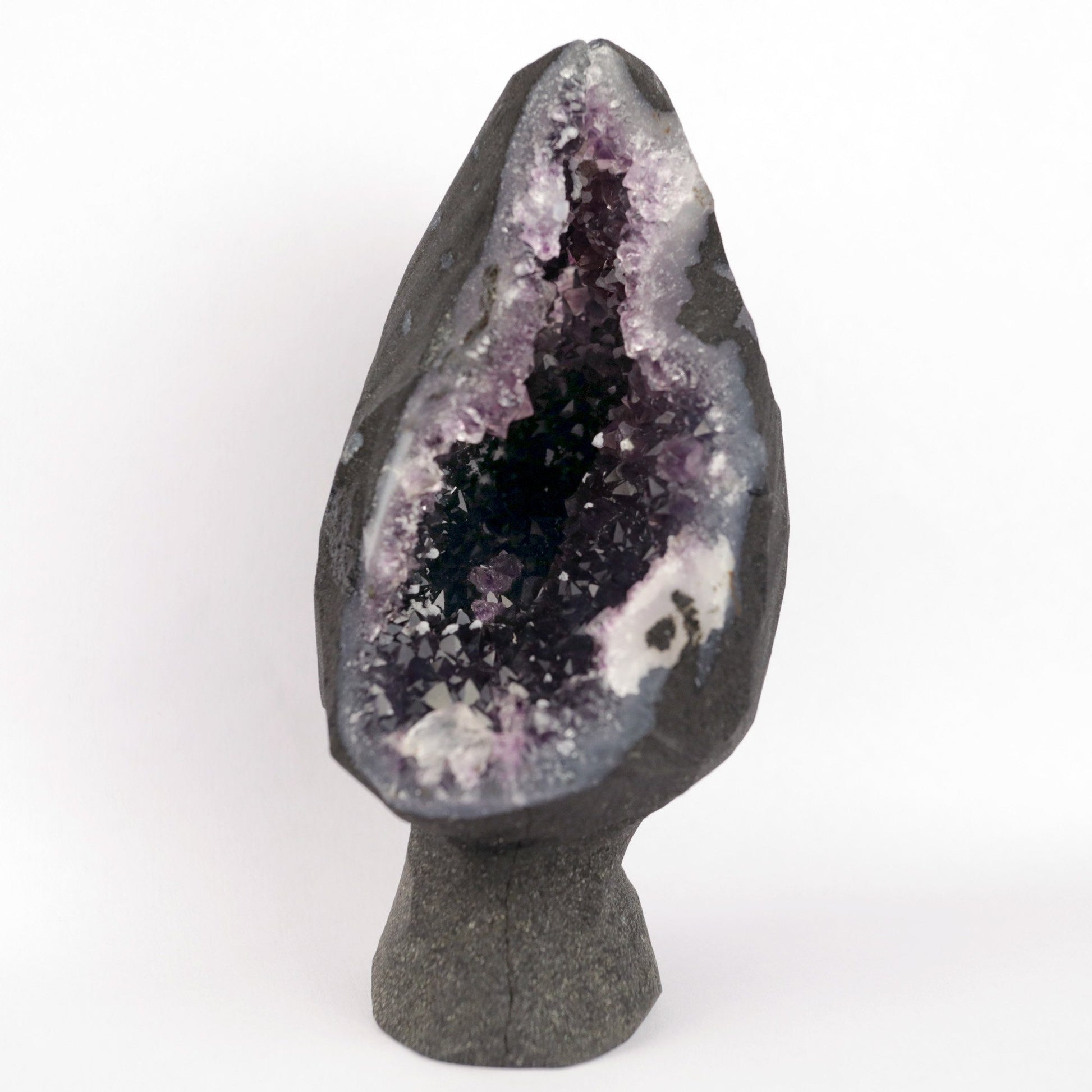 Sparkling Amethyst Geode Natural Mineral Specimen # B 4710  https://www.superbminerals.us/products/sparkling-amethyst-geode-natural-mineral-specimen-b-4710  Features: A very large plate of lustrous, large deep-purple Amethyst crystals with two clusters (one large and one smaller) of highly translucent, colorless, intergrown parallel “nailhead spar” crystals emanating from the center of the plate of Amethyst. It is incredible! Amazing color, luster, symmetry 