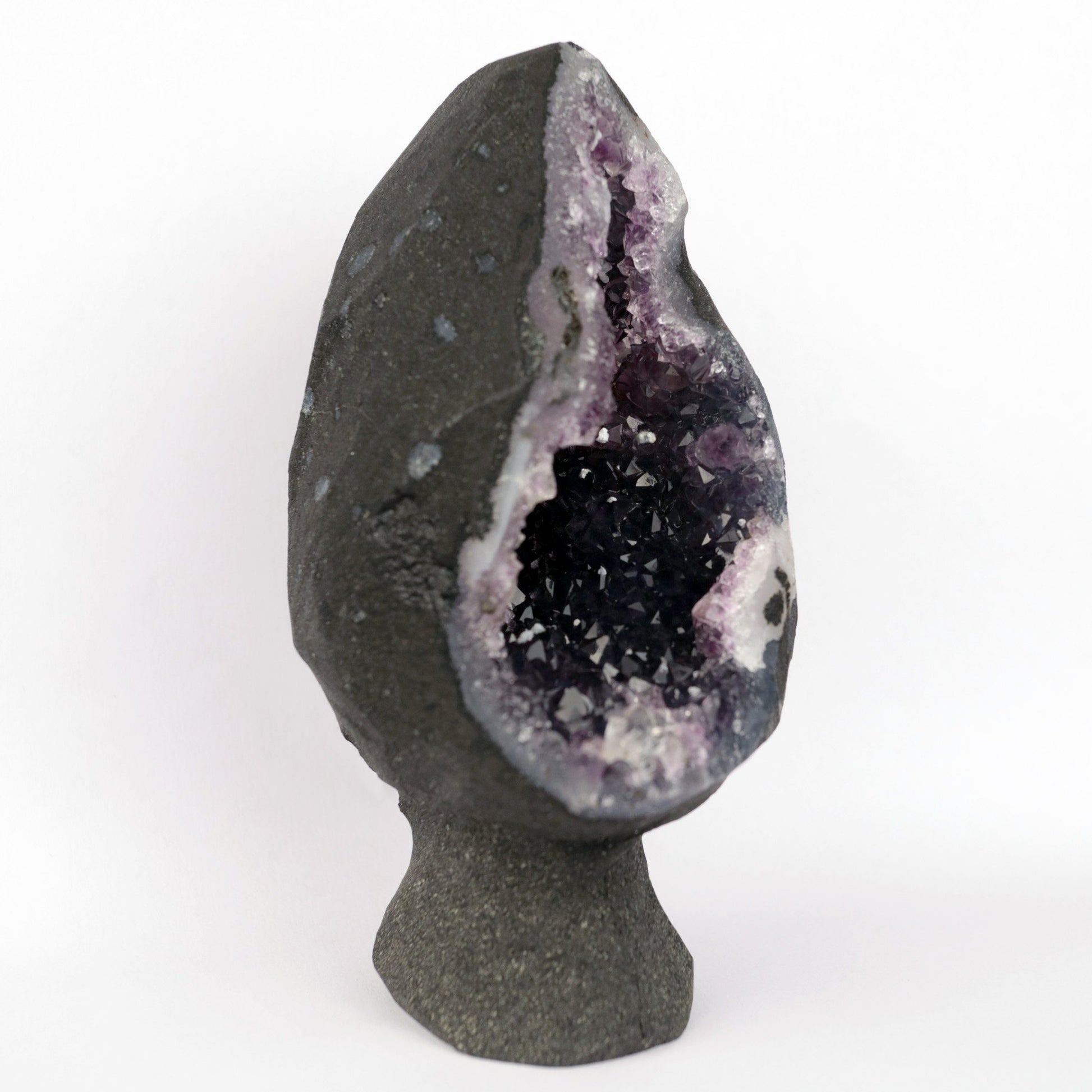 Sparkling Amethyst Geode Natural Mineral Specimen # B 4710  https://www.superbminerals.us/products/sparkling-amethyst-geode-natural-mineral-specimen-b-4710  Features: A very large plate of lustrous, large deep-purple Amethyst crystals with two clusters (one large and one smaller) of highly translucent, colorless, intergrown parallel “nailhead spar” crystals emanating from the center of the plate of Amethyst. It is incredible! Amazing color, luster, symmetry 