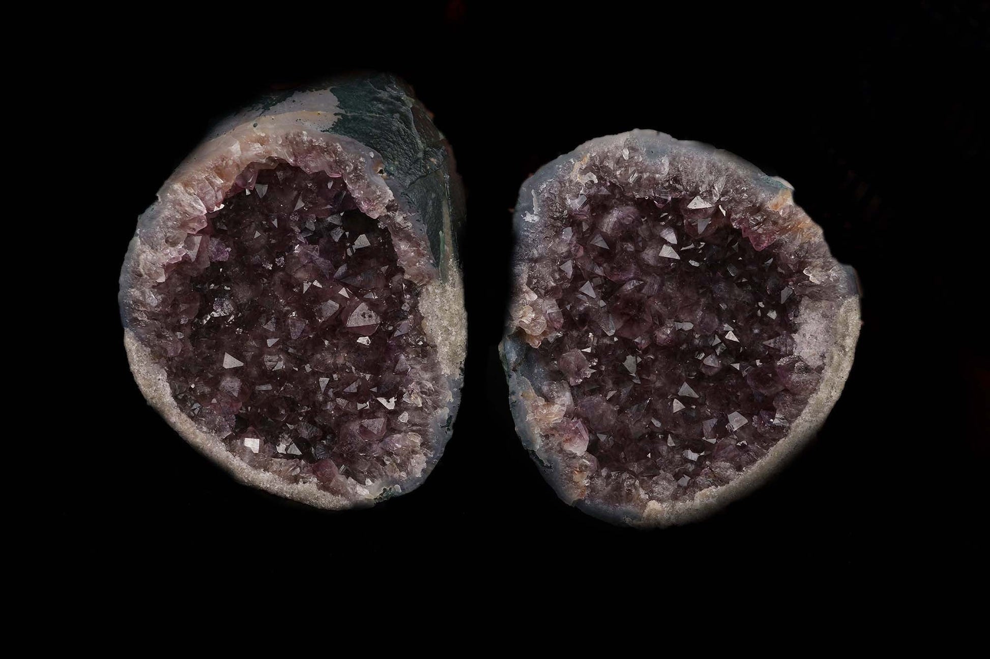 Sparkling Amethyst Two Halves Natural Mineral Specimen # B 5221  https://www.superbminerals.us/products/sparkling-amethyst-two-halves-natural-mineral-specimen-b-5221  Features: This essay highlights the importance of never judging a book by its cover. When you look at these two halves together, it's plain and unappealing. Even unappealing. It's a breathtaking contrast to see the sparkling, purple Amethyst crystals lining the entire chamber on both half as it splits apart!
