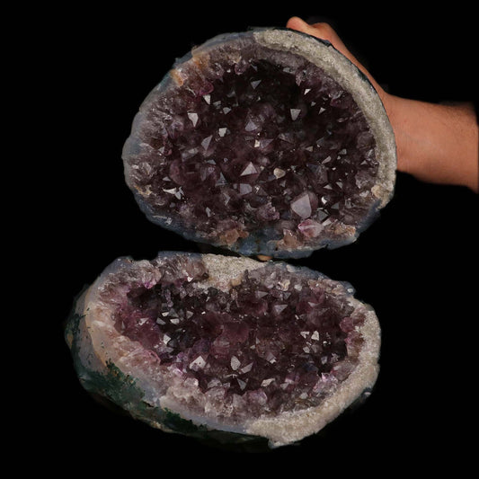 Sparkling Amethyst Two Halves Natural Mineral Specimen # B 5221  https://www.superbminerals.us/products/sparkling-amethyst-two-halves-natural-mineral-specimen-b-5221  Features: This essay highlights the importance of never judging a book by its cover. When you look at these two halves together, it's plain and unappealing. Even unappealing. It's a breathtaking contrast to see the sparkling, purple Amethyst crystals lining the entire chamber on both half as it splits apart!