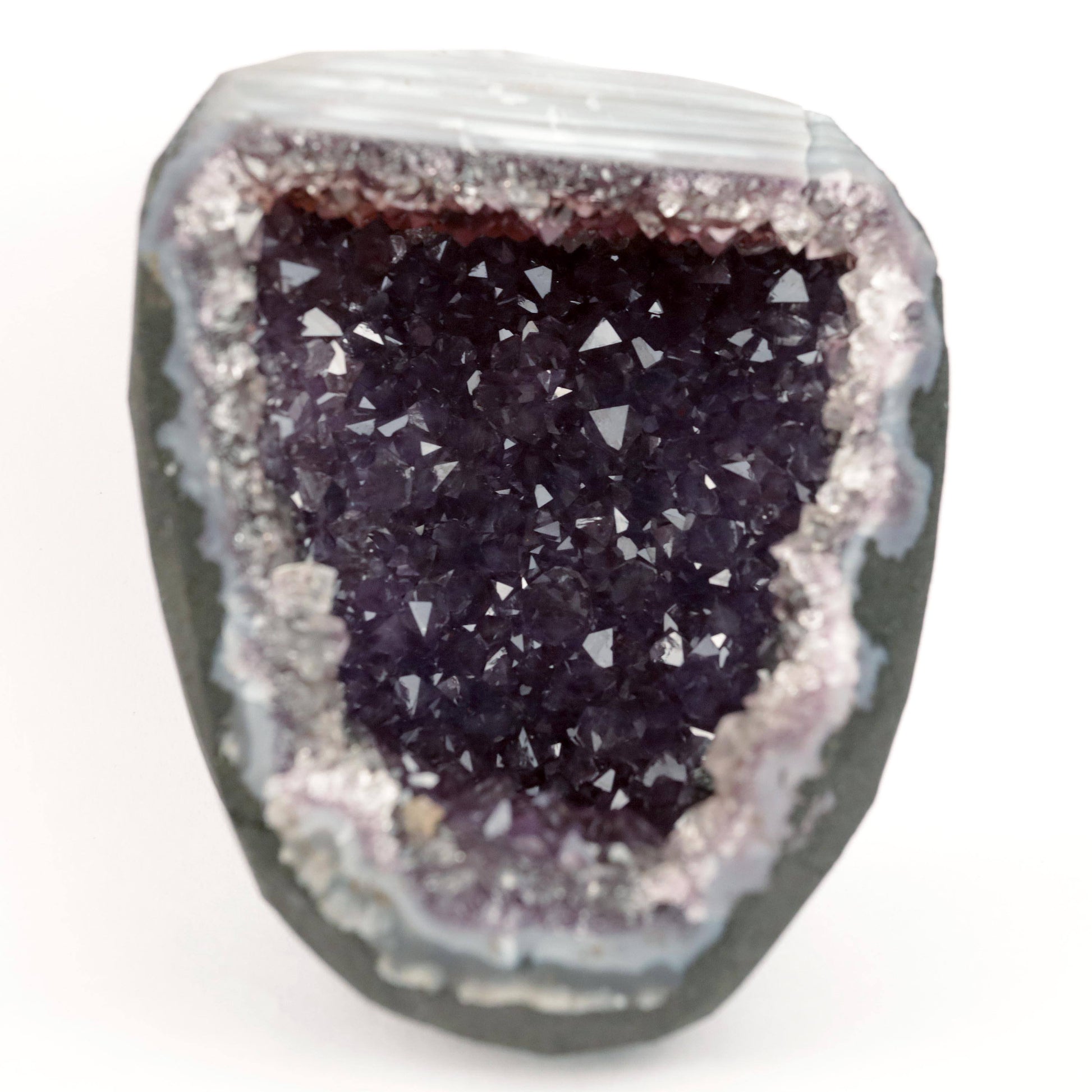Sparkling Purple Amethyst Geode Natural Mineral Specimen # B 4636  https://www.superbminerals.us/products/sparkling-purple-amethyst-geode-natural-mineral-specimen-b-4636  Features: Large Amethyst Cluster with rich purple gems. Stunning Amethyst has a vibrant, rich hue and a brilliant sparkle. Besides its colour and brilliance, I chose this piece for its unusual and asymmetrical form. In a sea of identical-looking geodes, it stood out. I would recommend this as a decorative item. 
