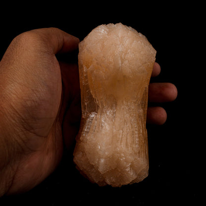 Stilbite Bow Shape Natural Mineral Specimen # B 5097  https://www.superbminerals.us/products/stilbite-bow-shape-natural-mineral-specimen-b-5097  Features: The best viewing angle for this specimen shows a 3-dimensional upright stilbite "bow tie," with a pastel salmon color and great luster and translucence. The matrix is a thin veneer of Heulandite. Primary Mineral(s): Stilbite Secondary Mineral(s): N/AMatrix: N/A 5 Inch x 2 InchWeight : 432