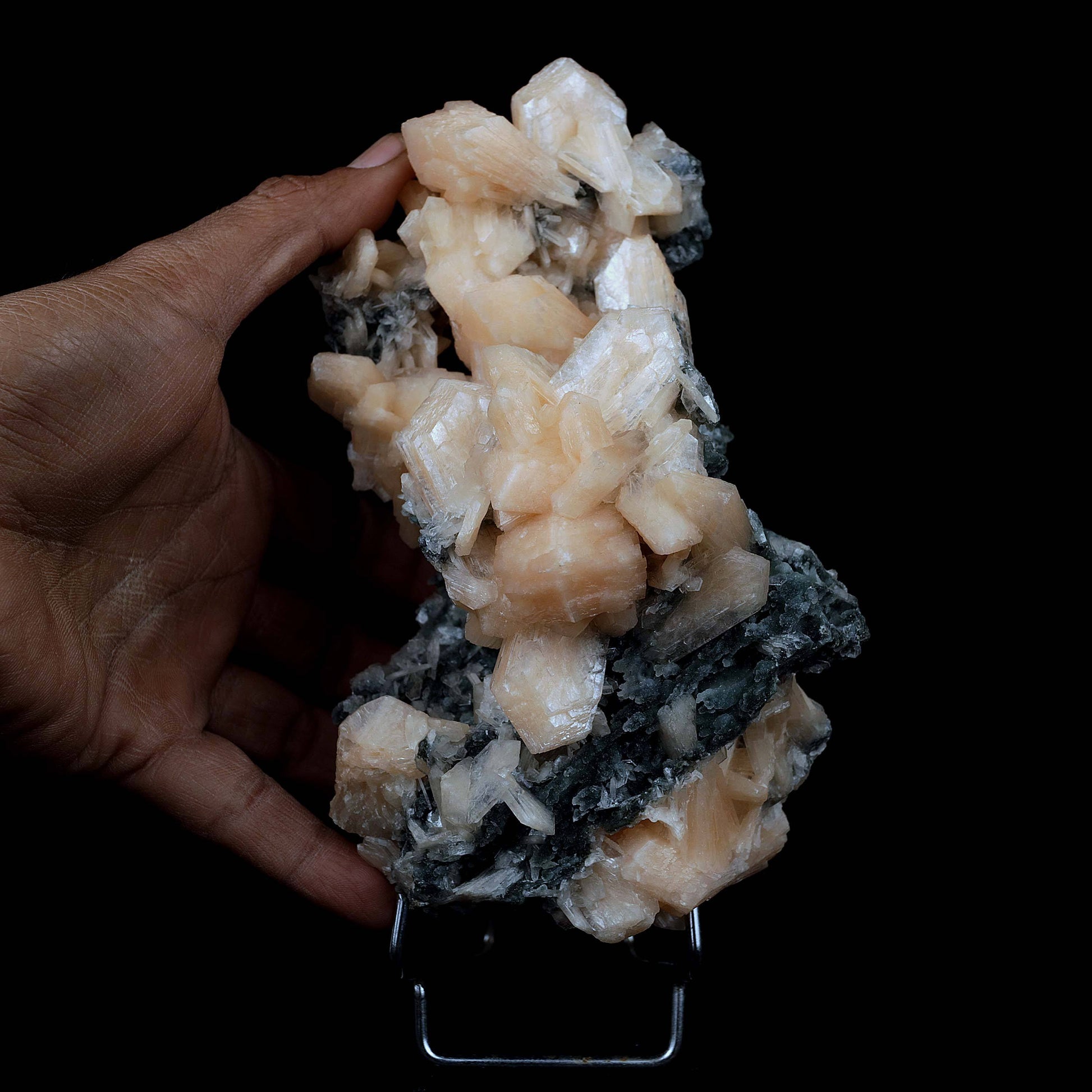 Stilbite Crystals on Chalcedony Big Cluster Natural Mineral Specimen #…  https://www.superbminerals.us/products/stilbite-crystals-on-chalcedony-big-cluster-natural-mineral-specimen-b-3996  Features A large sized pink tinged transparent chalcedony standing on top of a open vug like specimen with rich salmon colored Stilbites and other smaller sized pink Stilbite. The vug is very aesthetically cut and is high in luster and beauty. Primary Mineral(s):&nbsp; Stilbite