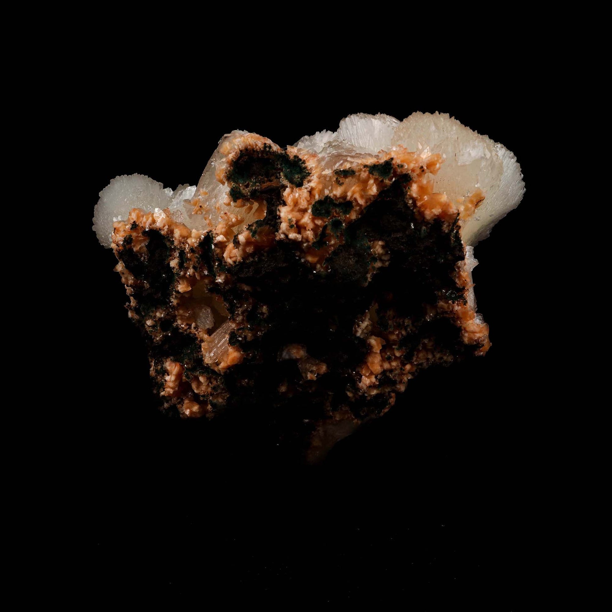 Stilbite Lusterous Cluster Natural Mineral Specimen # B 5185  https://www.superbminerals.us/products/stilbite-lusterous-cluster-natural-mineral-specimen-b-5185  Features: Featuring many excellent quality bladed groups of Stilbite in a soft white hue, resting over pearly stalactitic formations of peach colored Heulandite, this piece is a stunning example of the material. The sculpture is really flashy and three-dimensional, and I particularly like how the Stilbites 