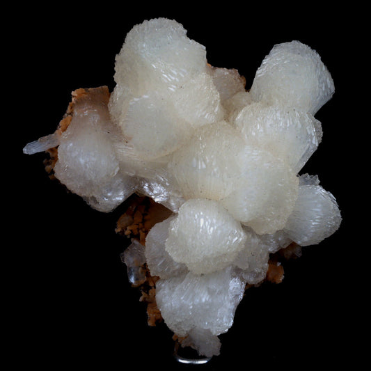 Stilbite Lusterous on Heulandite Natural Mineral Specimen # B 4917  https://www.superbminerals.us/products/stilbite-lusterous-on-heulandite-natural-mineral-specimen-b-4917  Features: A magnificent doubly terminated stilbite bowtie with outstanding wide shape is placed artistically on the blocky basalt matrix.&nbsp; The many glossy bone-white bladed heulandites scattered over the matrix beautifully compliment the very lustrous, transparent, cream-colored stilbite.