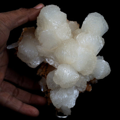 Stilbite Lusterous on Heulandite Natural Mineral Specimen # B 4917  https://www.superbminerals.us/products/stilbite-lusterous-on-heulandite-natural-mineral-specimen-b-4917  Features: A magnificent doubly terminated stilbite bowtie with outstanding wide shape is placed artistically on the blocky basalt matrix.&nbsp; The many glossy bone-white bladed heulandites scattered over the matrix beautifully compliment the very lustrous, transparent, cream-colored stilbite.