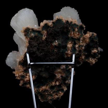 Stilbite Lusterous on Heulandite Natural Mineral Specimen # B 4917  https://www.superbminerals.us/products/stilbite-lusterous-on-heulandite-natural-mineral-specimen-b-4917  Features: A magnificent doubly terminated stilbite bowtie with outstanding wide shape is placed artistically on the blocky basalt matrix.&nbsp; The many glossy bone-white bladed heulandites scattered over the matrix beautifully compliment the very lustrous, transparent, cream-colored stilbite.