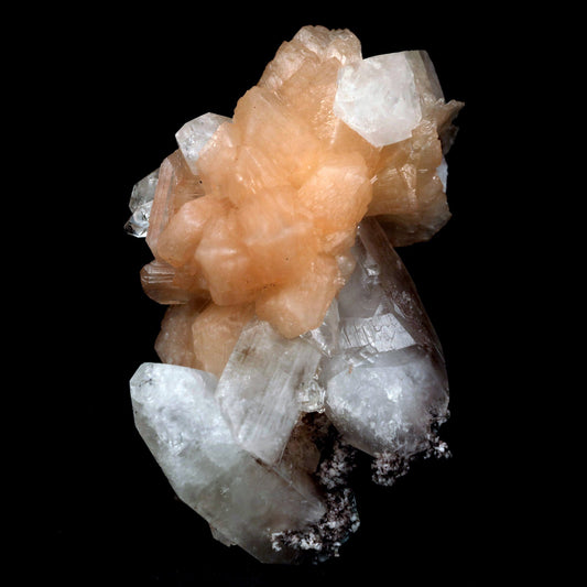 Stilbite with Apophyllite on Chalcedony Natural Mineral Specimen # B …  https://www.superbminerals.us/products/stilbite-with-apophyllite-natural-mineral-specimen-b-4799  Features: An impressive doubly terminated, lustrous salmon-pink bladed stilbite bowtie, nicely accented with side car crystals, is dramatically set on the thin basalt crust on this beautifully sculptural small cabinet from recent finds in Jalgaon. The secondary doubly terminated stilbite. Small stilbite and smaller