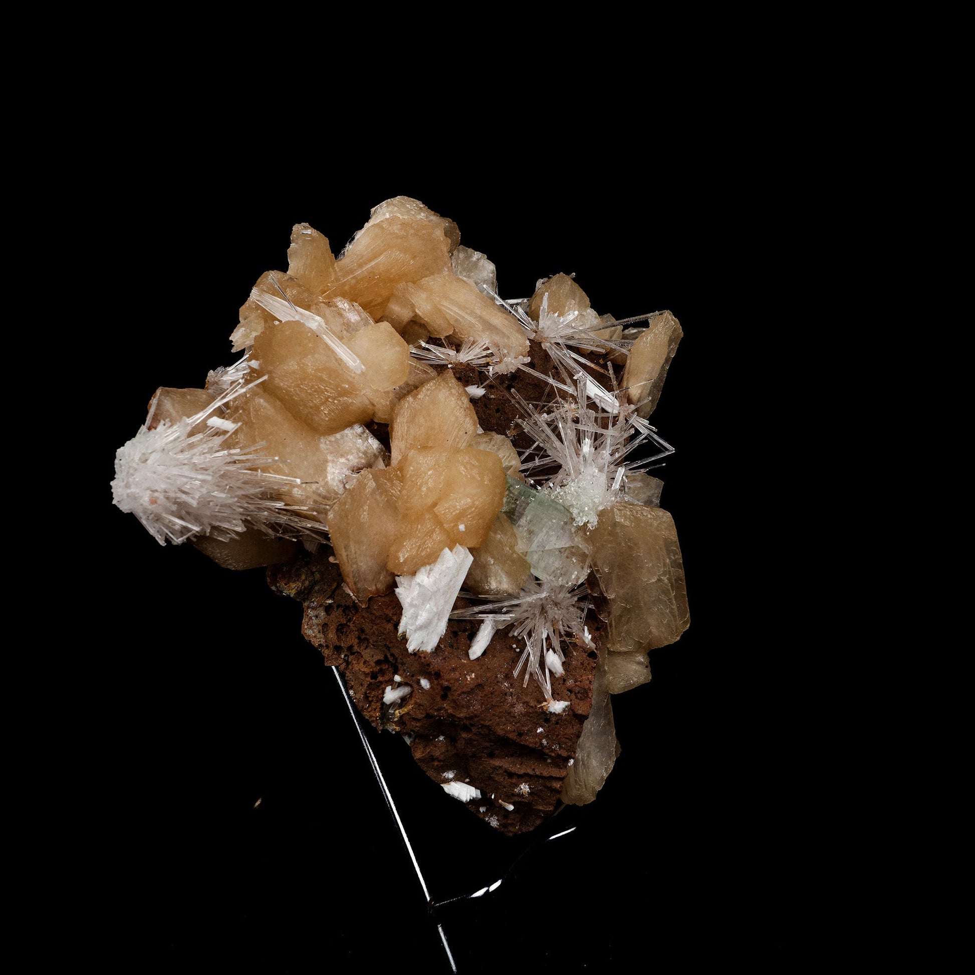 Stilbite with Scolecite Sprays Natural Mineral Specimen # B 5274  https://www.superbminerals.us/products/stilbite-with-scolecite-sprays-natural-mineral-specimen-b-5274  Features: This specimen features a large, radial formation of colorless, transparent, lustrous acicular Scolecite crystals on peach-colored Stilbite. Primary Mineral(s): Scolecite Secondary Mineral(s): StilbiteMatrix: N/A 7 Inch x 6 InchWeight : 955 GmsLocality: Jalgaon, Maharashtra, India Year of Discovery: 2021