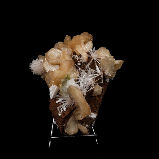 Stilbite with Scolecite Sprays Natural Mineral Specimen # B 5274  https://www.superbminerals.us/products/stilbite-with-scolecite-sprays-natural-mineral-specimen-b-5274  Features: This specimen features a large, radial formation of colorless, transparent, lustrous acicular Scolecite crystals on peach-colored Stilbite. Primary Mineral(s): Scolecite Secondary Mineral(s): StilbiteMatrix: N/A 7 Inch x 6 InchWeight : 955 GmsLocality: Jalgaon, Maharashtra, India Year of Discovery: 2021