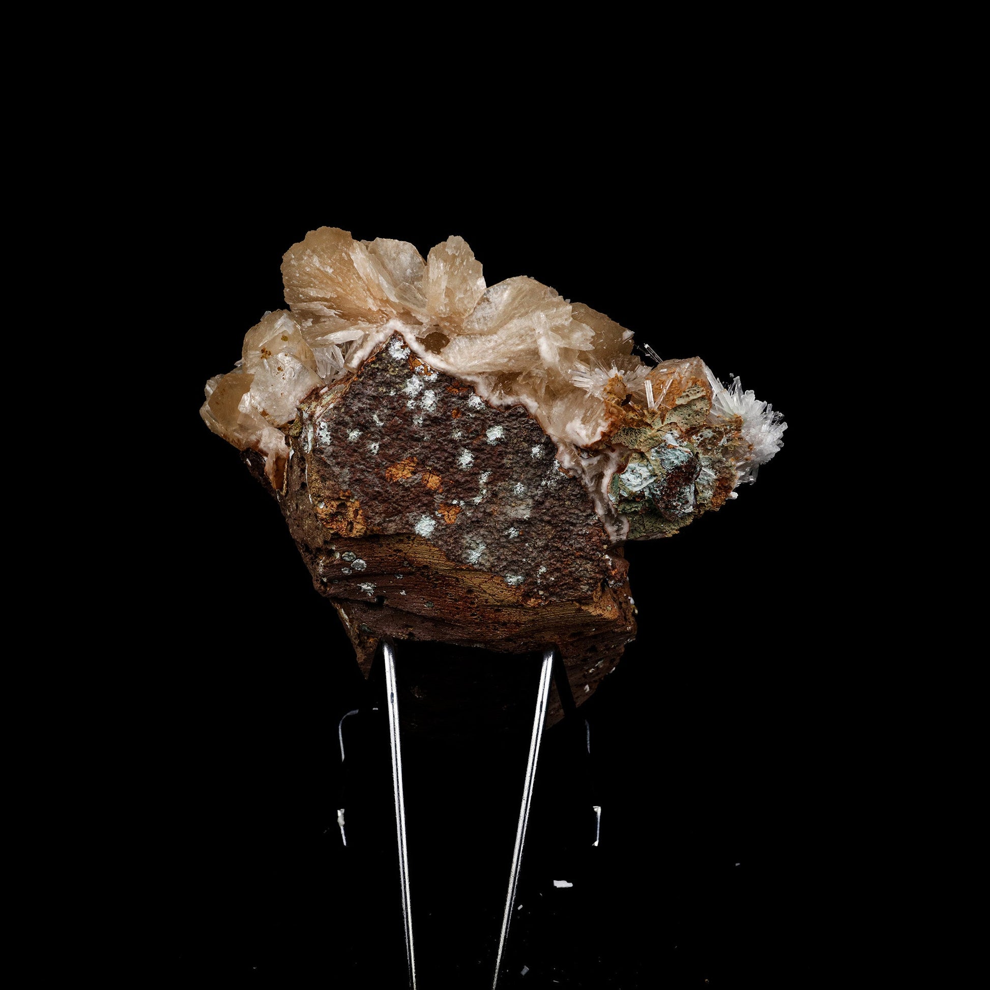 Stilbite with Scolecite Sprays Natural Mineral Specimen # B 5274  https://www.superbminerals.us/products/stilbite-with-scolecite-sprays-natural-mineral-specimen-b-5274  Features: This specimen features a large, radial formation of colorless, transparent, lustrous acicular Scolecite crystals on peach-colored Stilbite. Primary Mineral(s): Scolecite Secondary Mineral(s): StilbiteMatrix: N/A 7 Inch x 6 InchWeight : 955 GmsLocality: Jalgaon, Maharashtra, India Year of Discovery: 2021